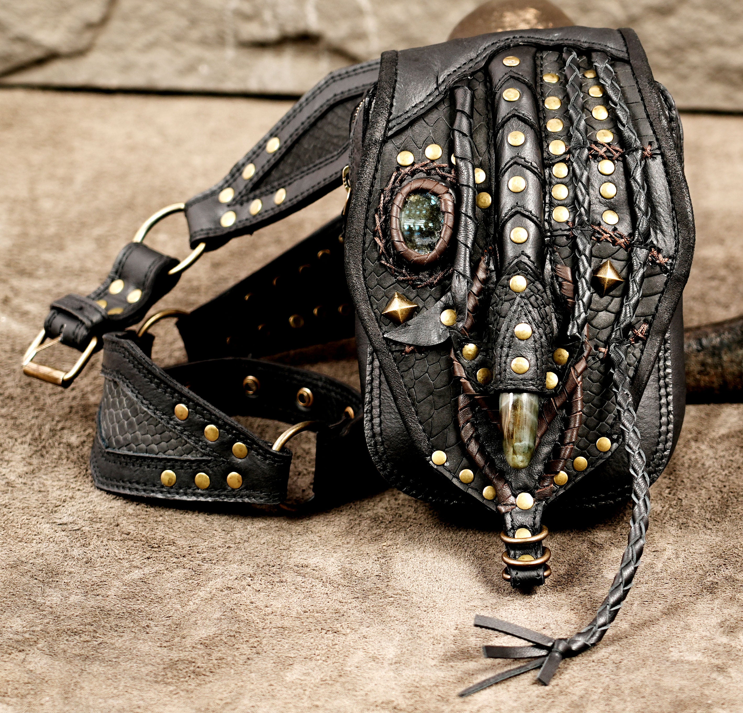 Leather festival hip pouch with handcrafted braided details and stone
