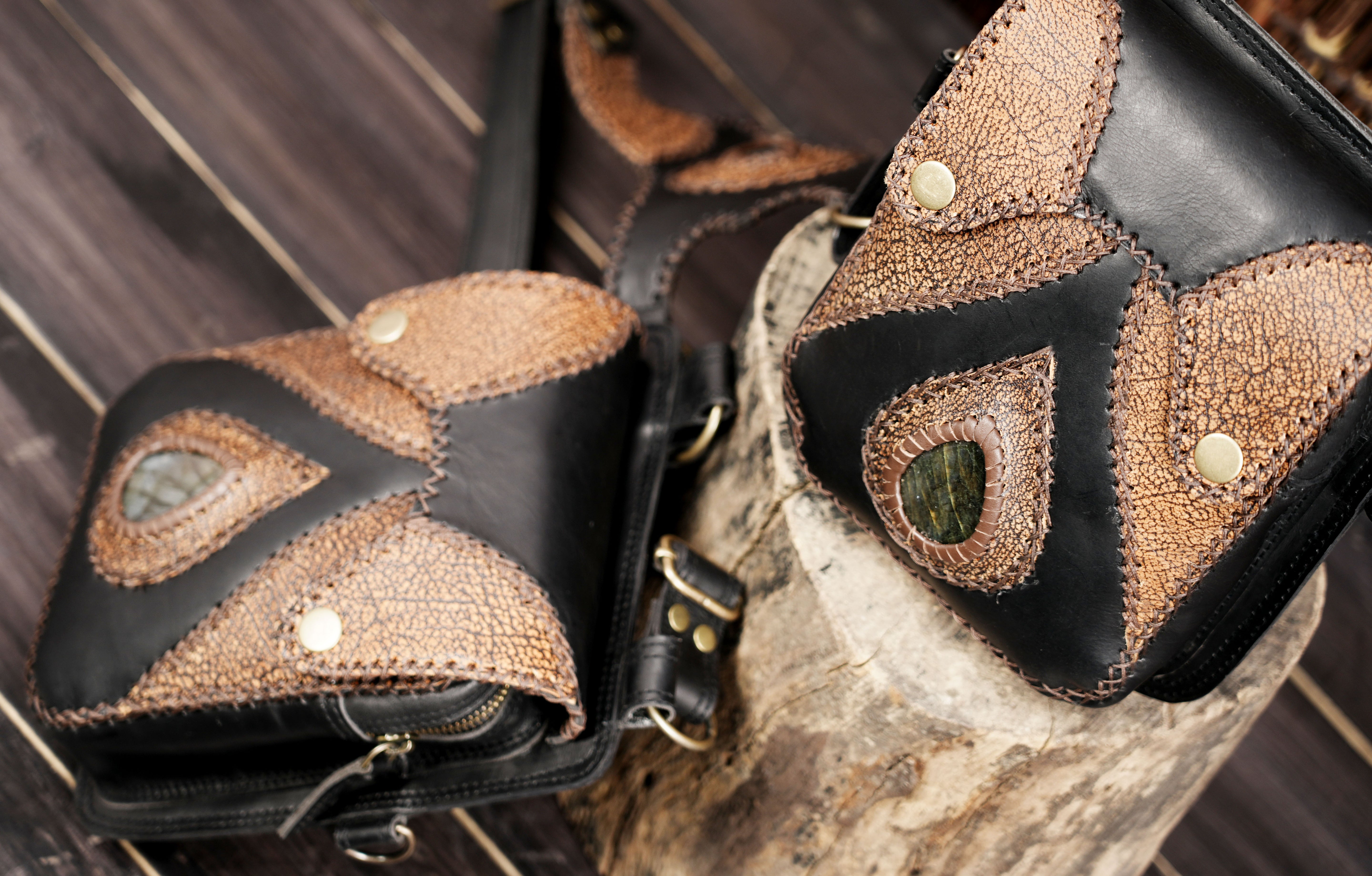 Leather crossbody holster with metal hardware and secure buckle fit