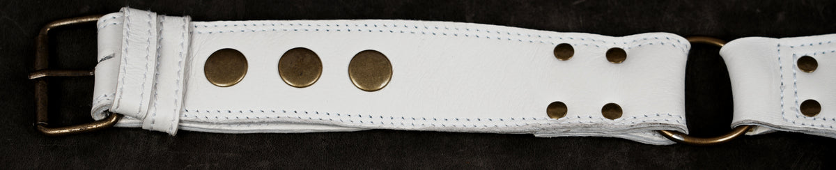 Western white leather belt bag with fringe and stud embellishments