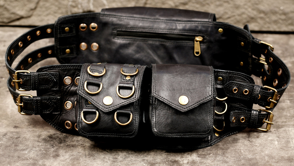 Three-pocket leather utility belt with brass-tone fittings and visible stitching.