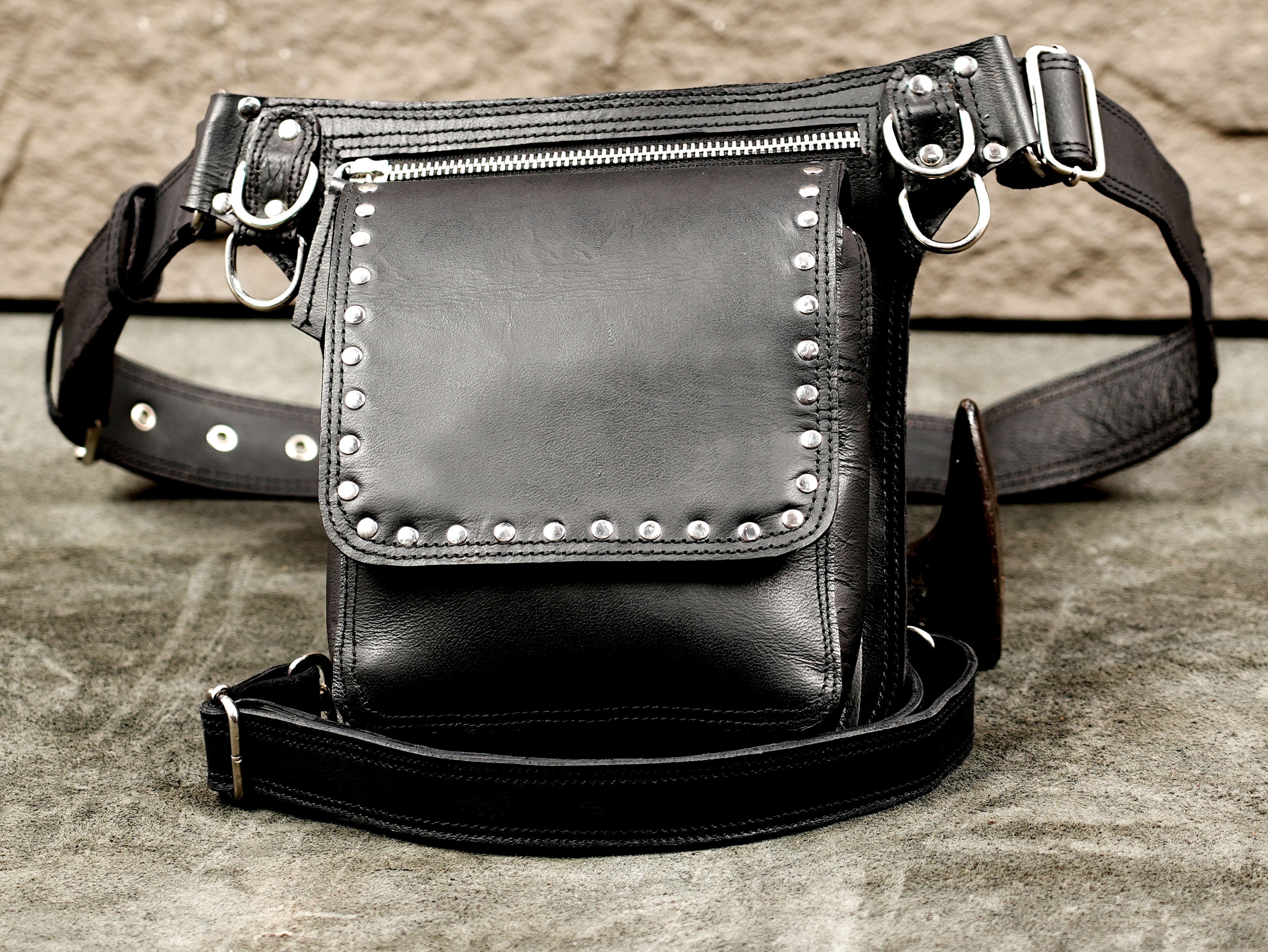 Black leather hands-free festival waist bag with leg loop strap
