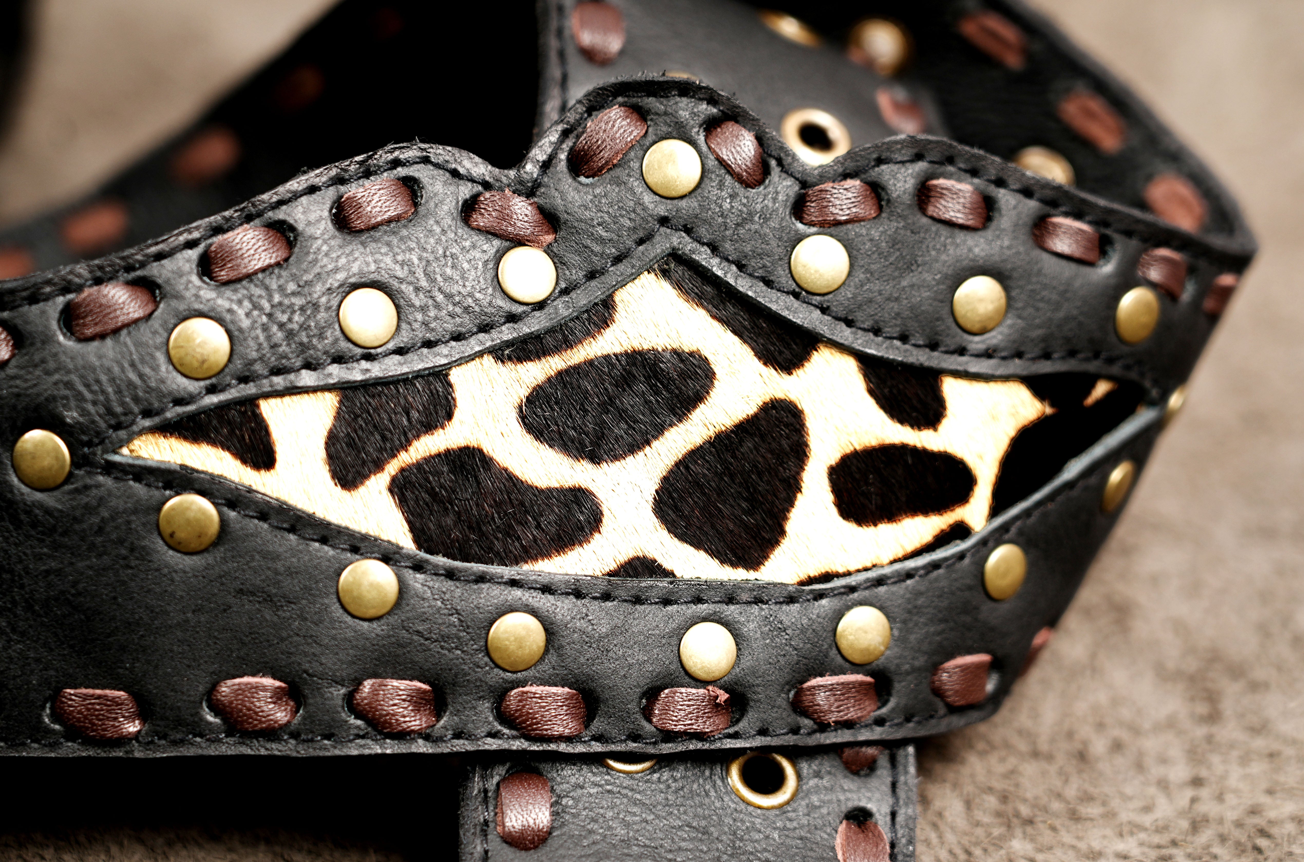 Black Leather Fringe Waist Belt Bag with Cow Print Detail and Antique Brass Hardware