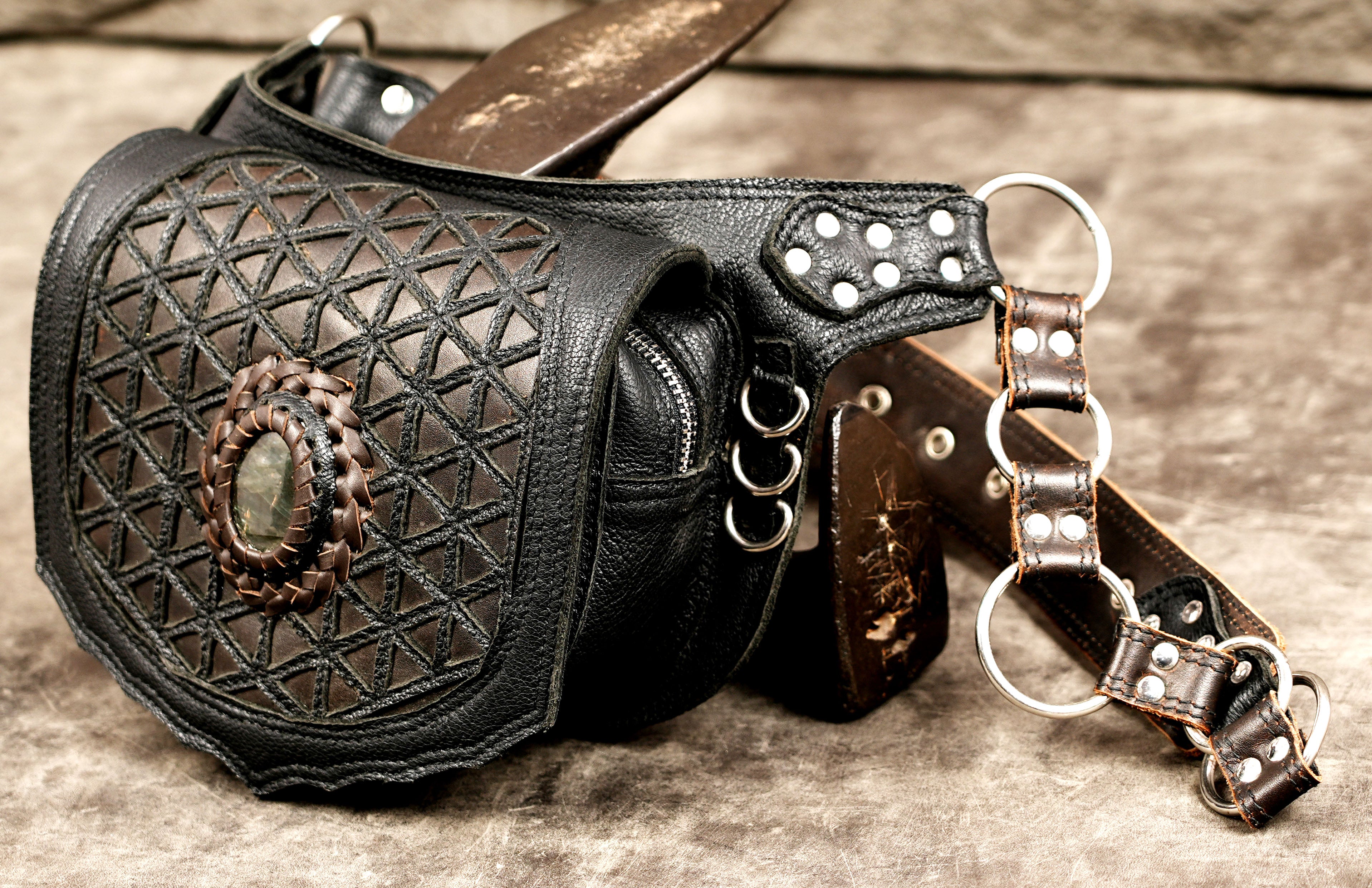 Handmade leather belt bag with sacred pattern and natural gemstone for festivals