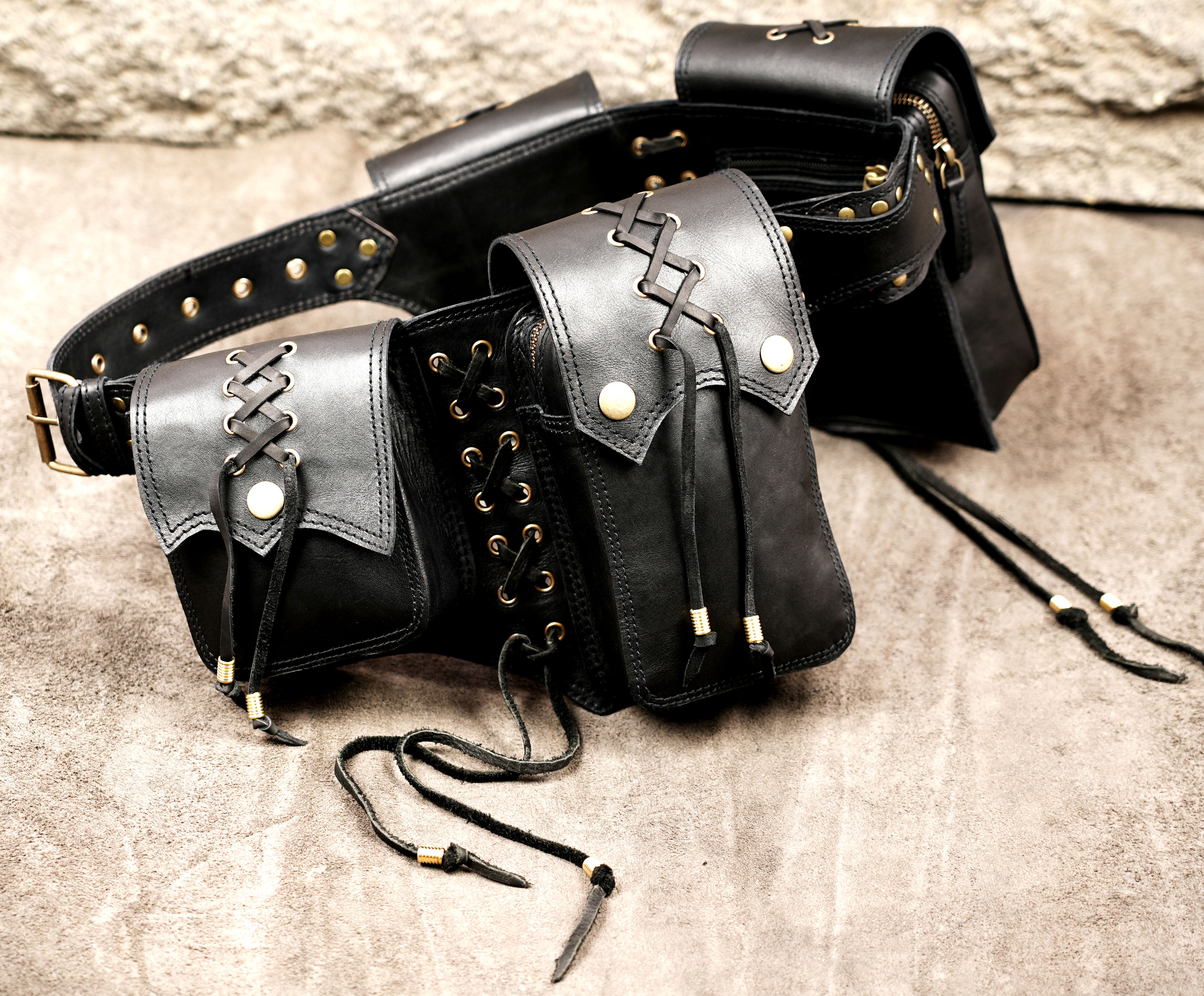 Black leather battle belt with antique brass accents