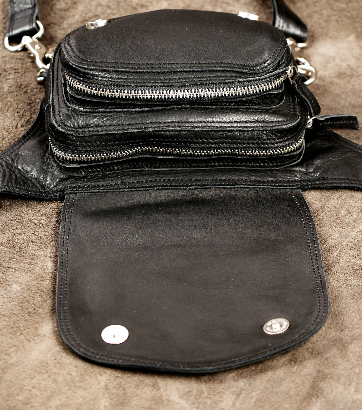Authentic leather waist holster featuring a secure thigh strap for active outdoor lifestyles