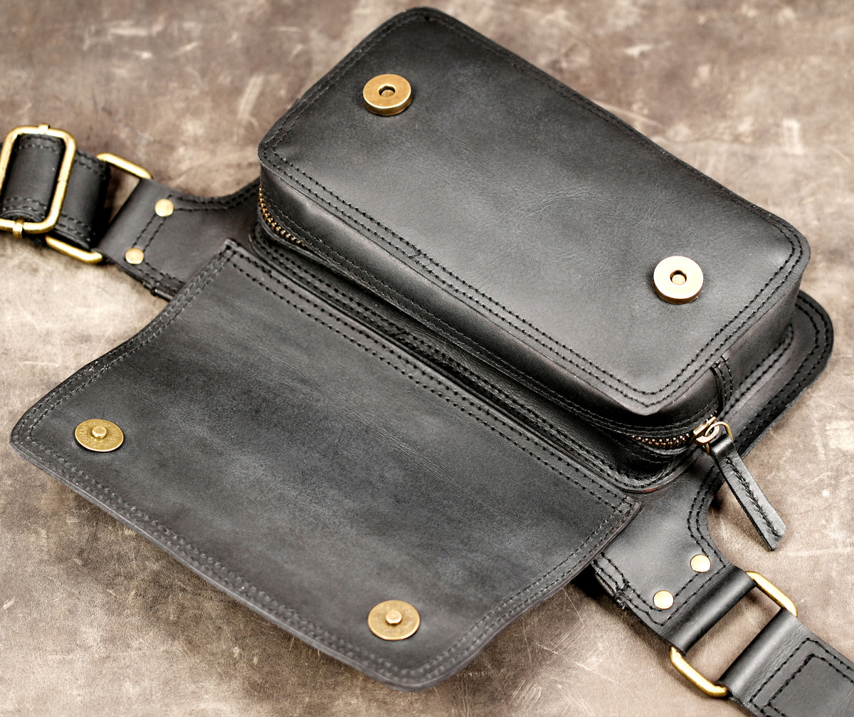 Handmade black leather hip bag for travel and daily use
