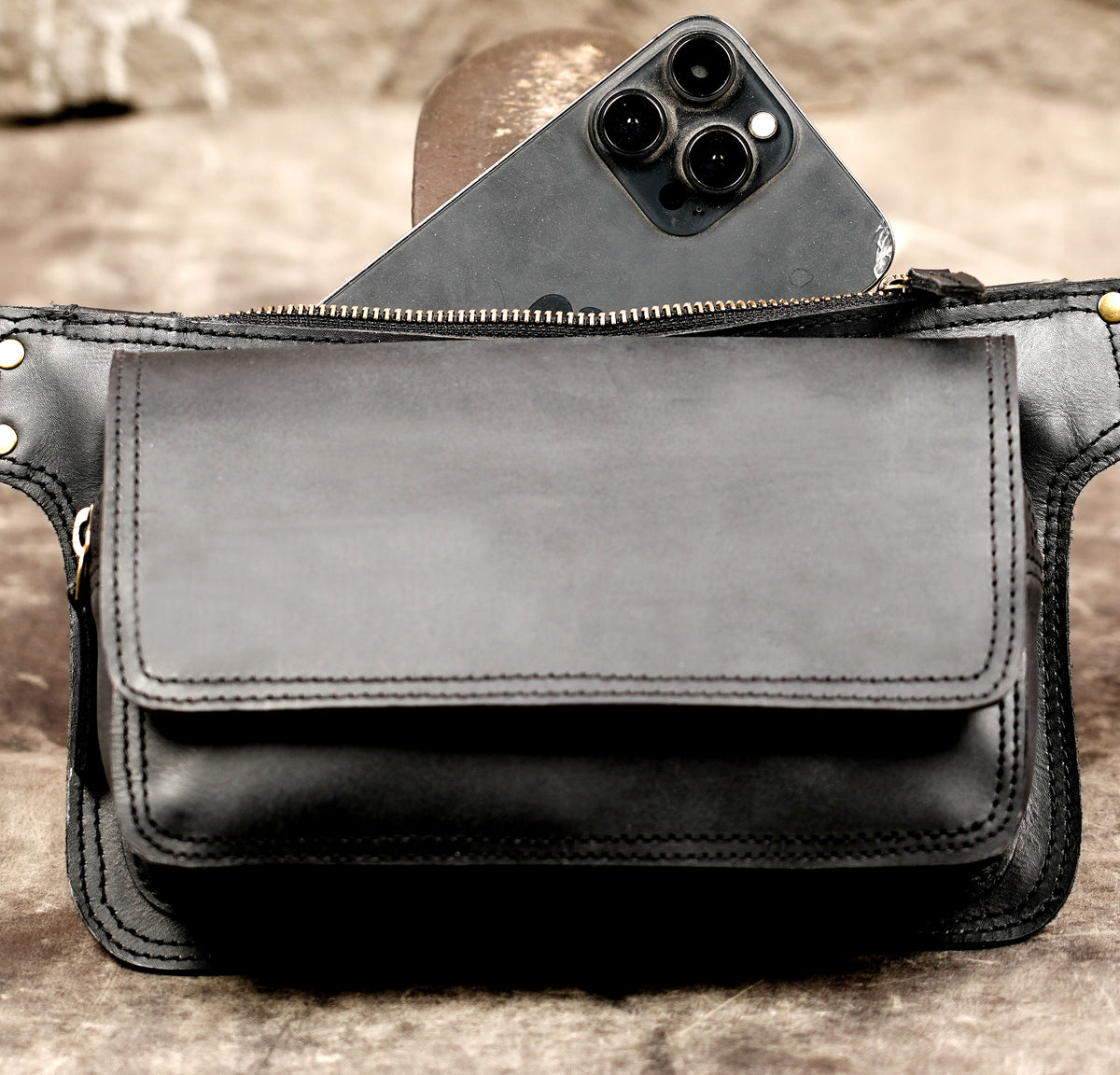 Leather belt pouch designed for convenient hands-free carrying