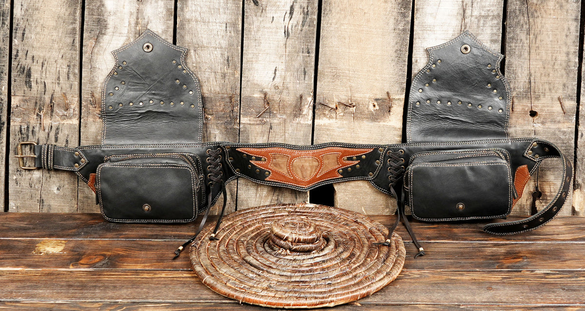 Western leather utility belt bag with two pockets, adjustable waist belt, and handmade detailing