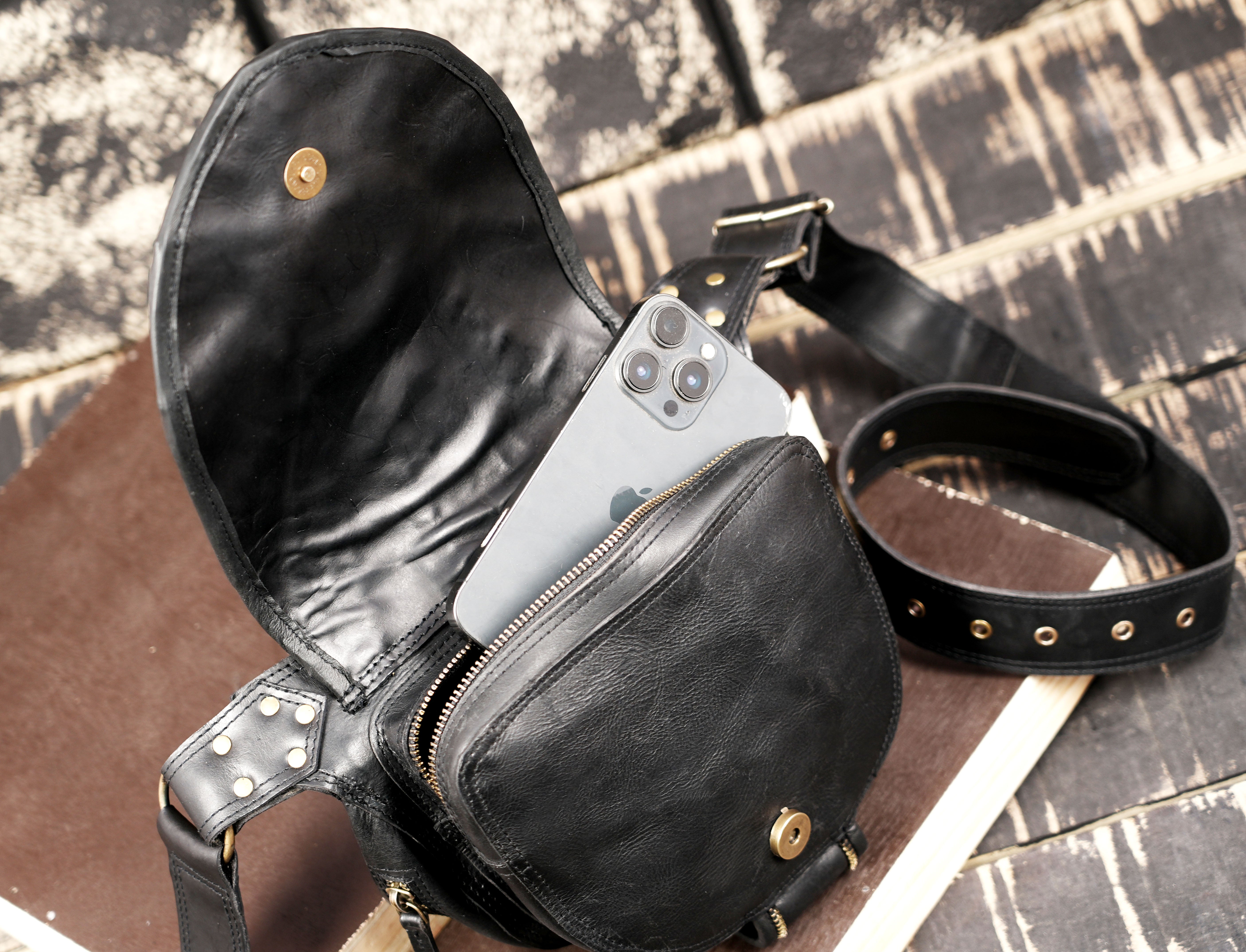 Black leather belt bag close up
