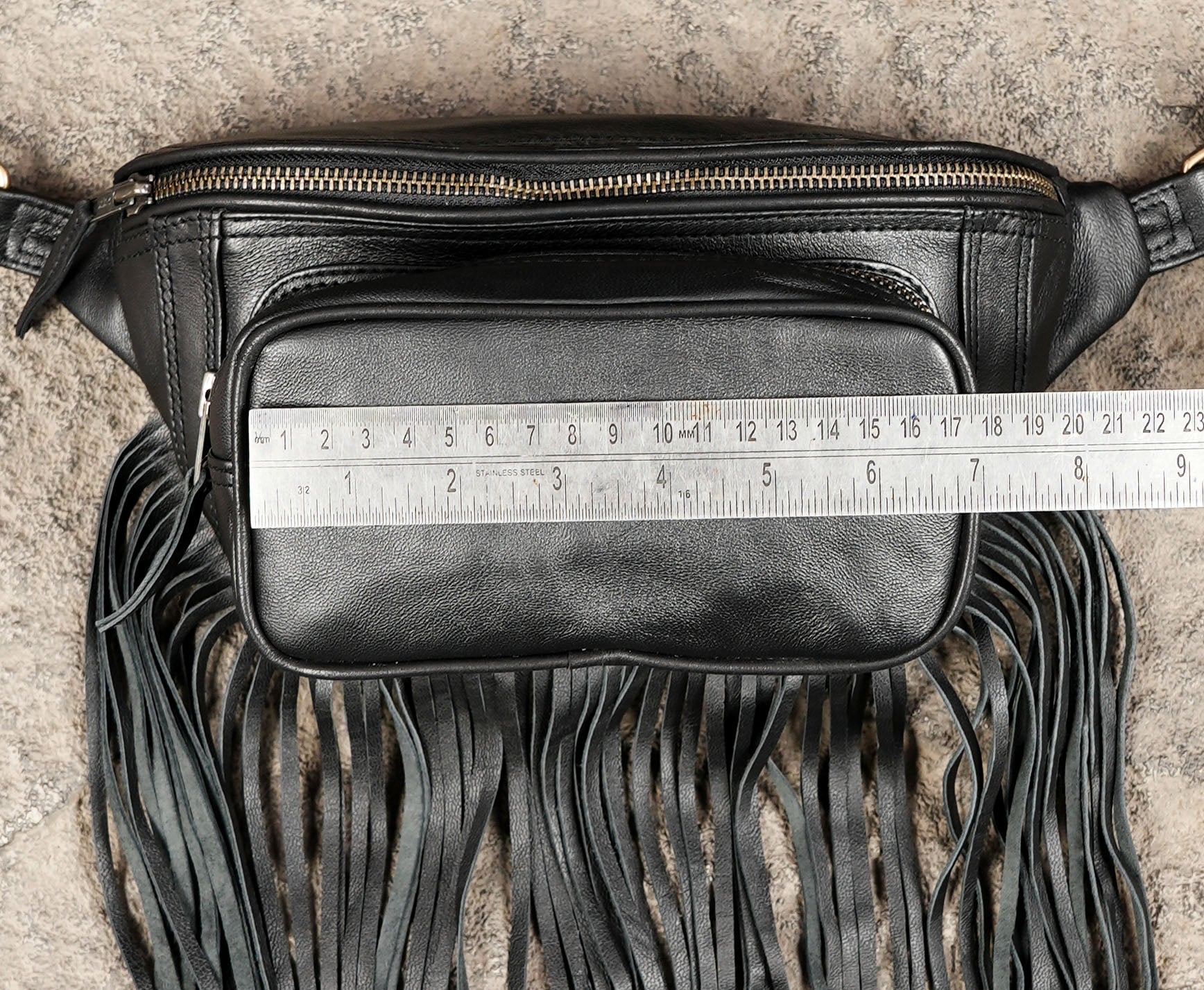 Black leather travel waist pouch with adjustable strap