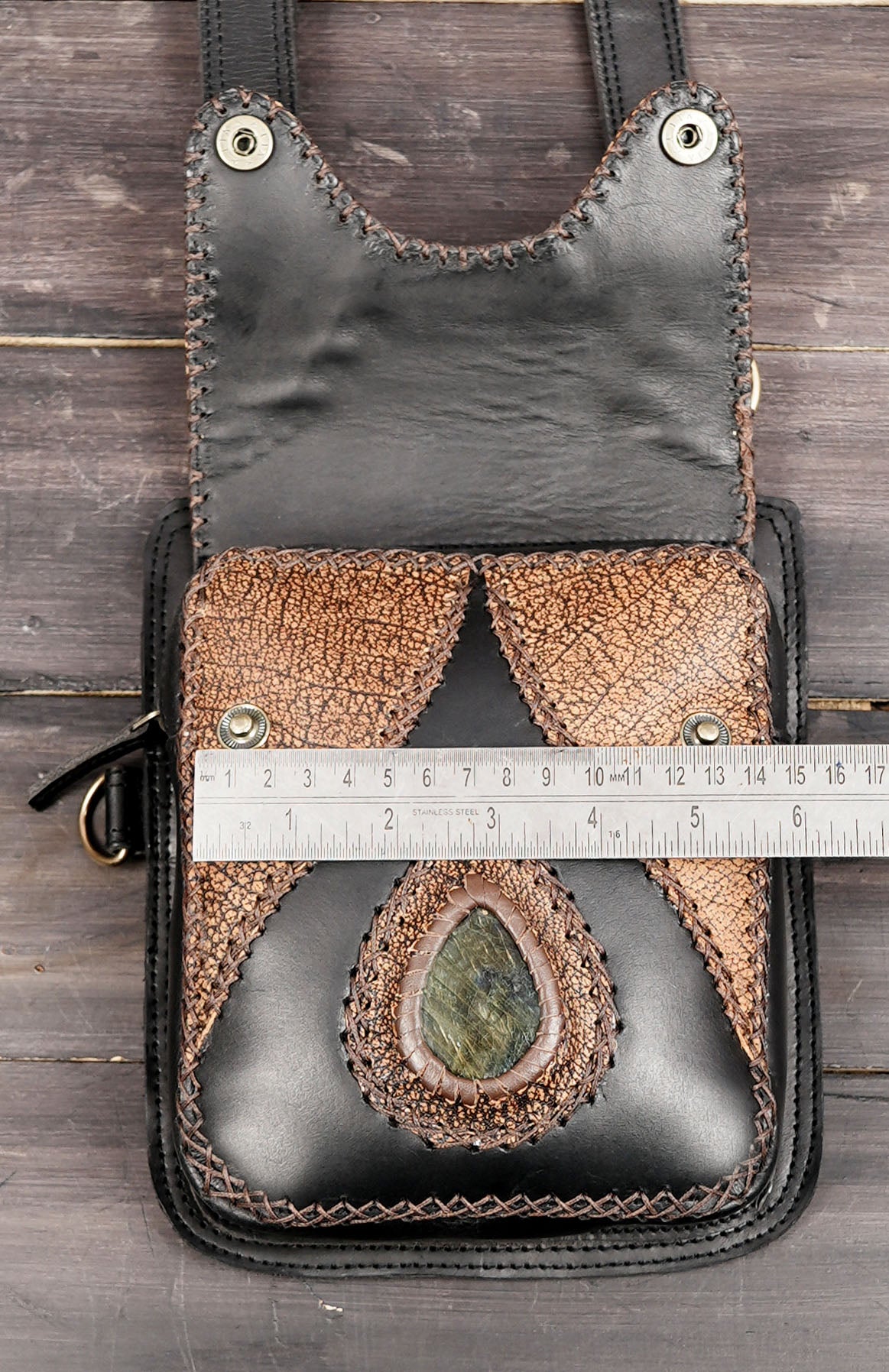 Multi pocket leather chest bag with solid brass fittings