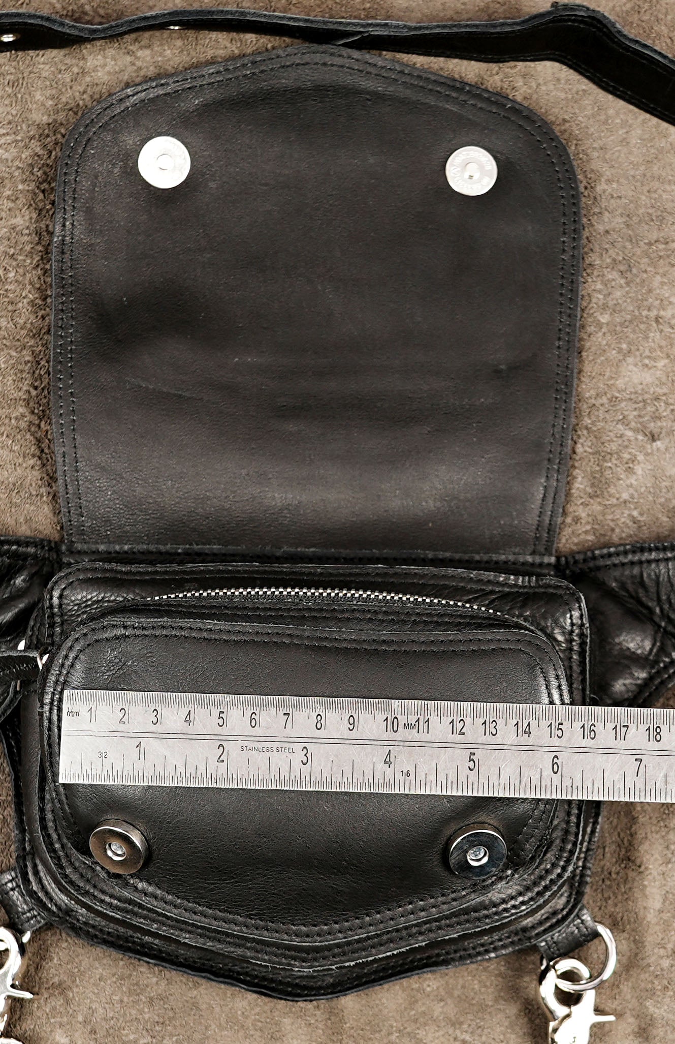 Durable genuine leather leg pouch offering a secure fit for daily commuting or riding