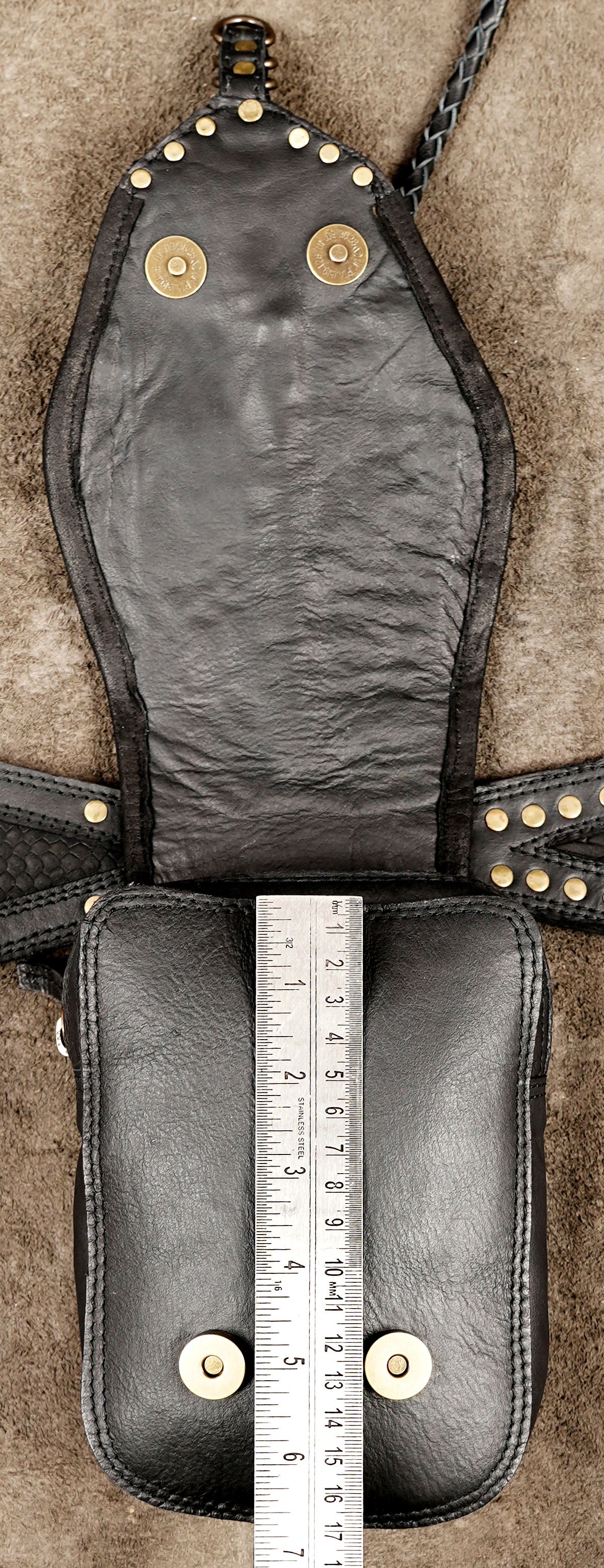 Adjustable leather hip bag with handcrafted textured leather design