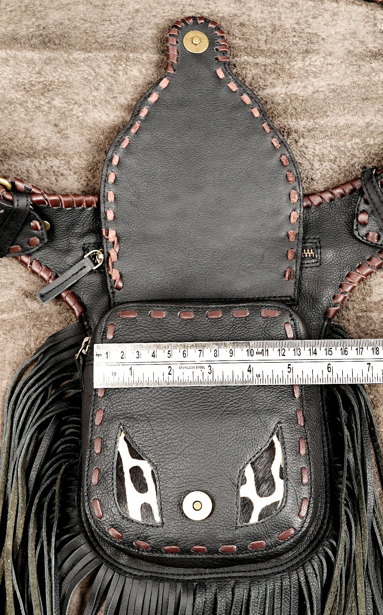 Black Leather Fringe Waist Belt Bag with Cow Print Detail and Antique Brass Hardware