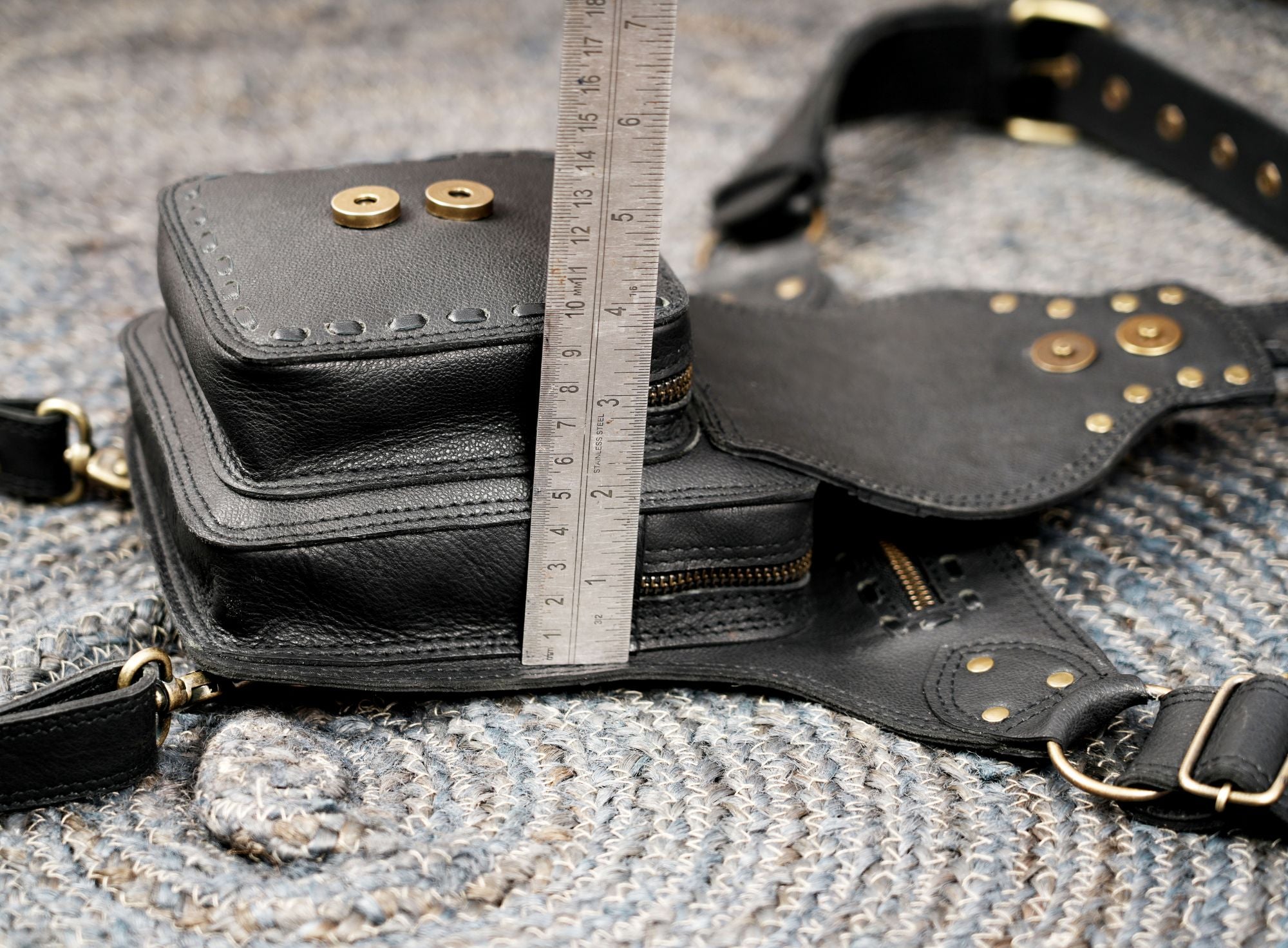 Adjustable leather thigh belt with secure zipper pocket