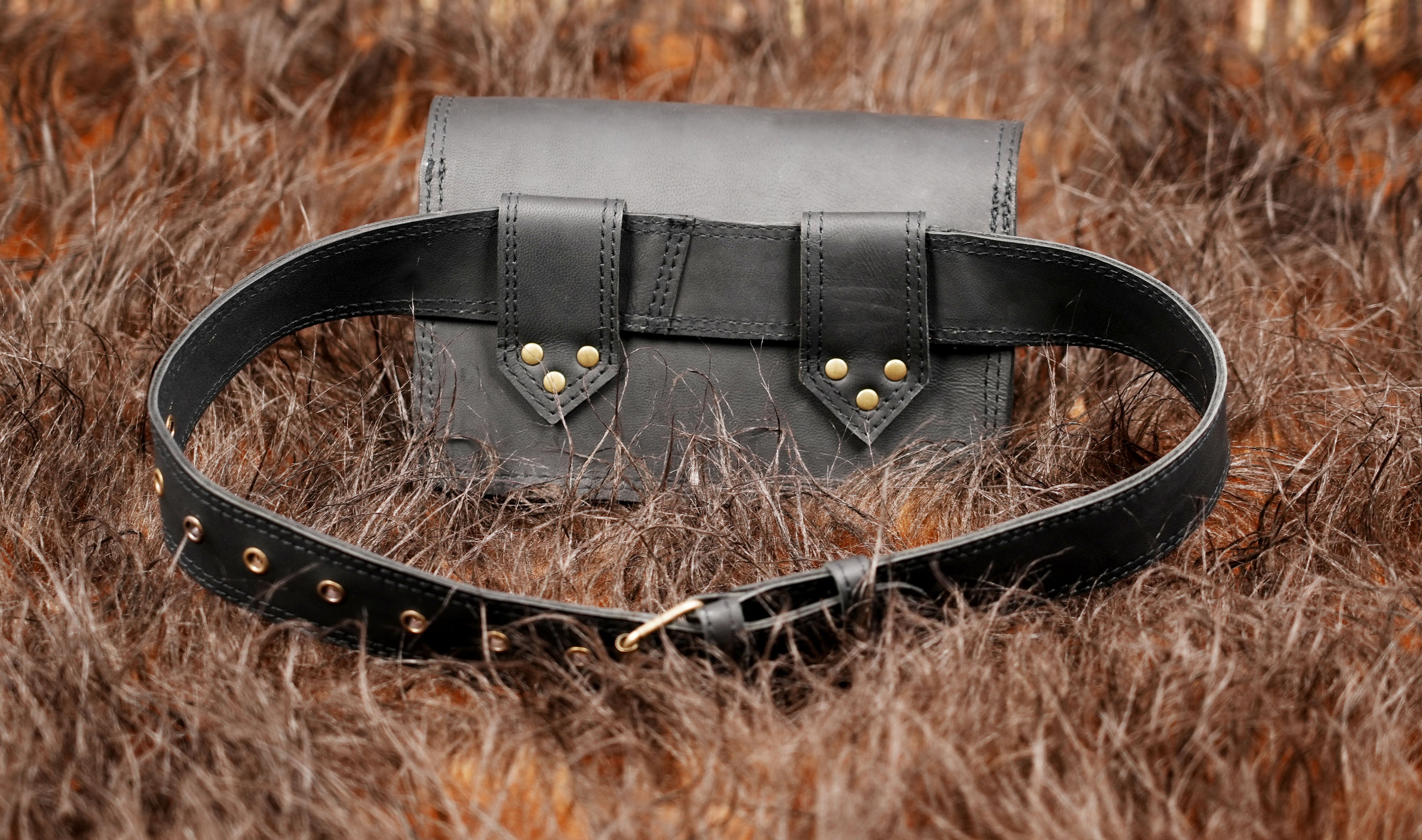 Leather utility waist bag with adjustable strap and buckle