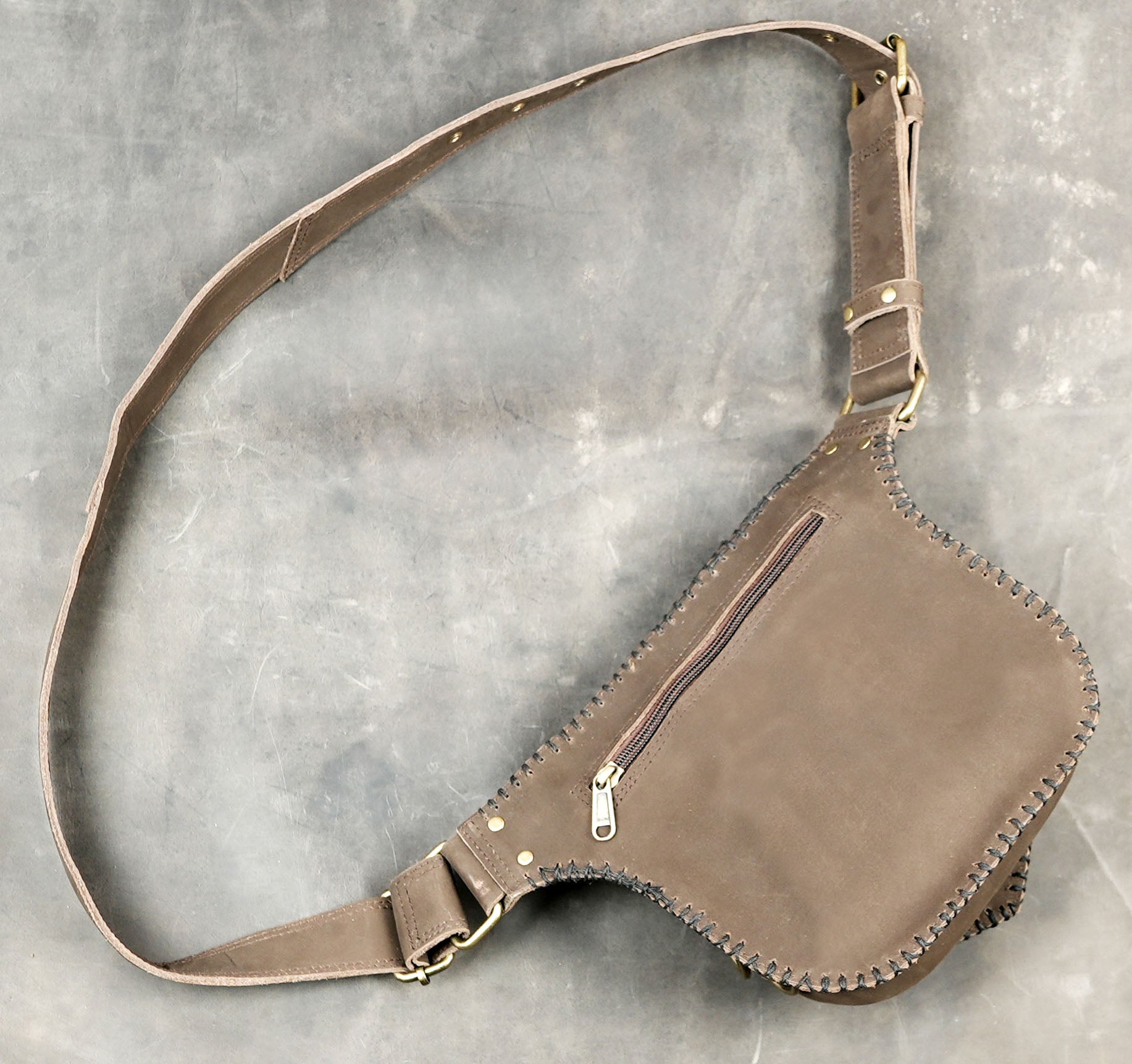 Bohemian style waist bag with hand-braided stone accent