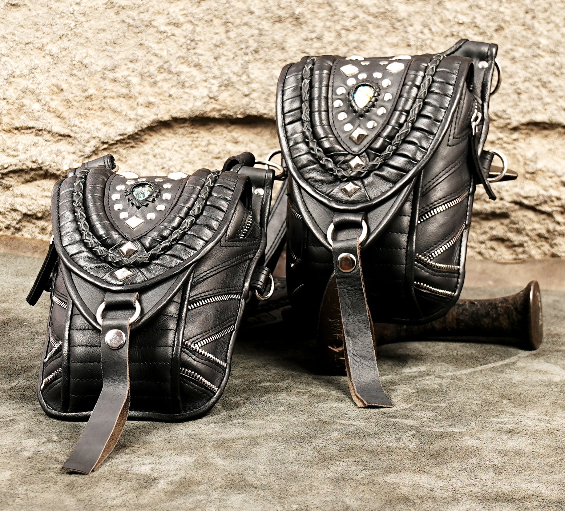 Black leather travel holster bag with anti theft underarm straps and dual pockets