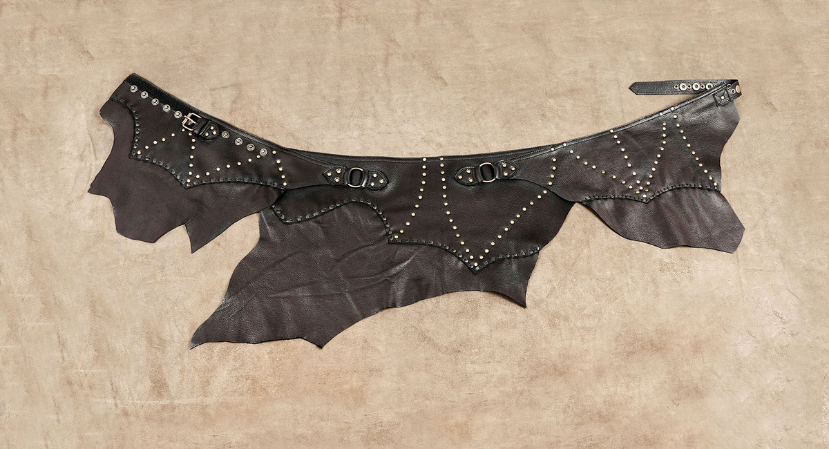 Dark brown asymmetrical leather skirt for Burning Man and music festivals