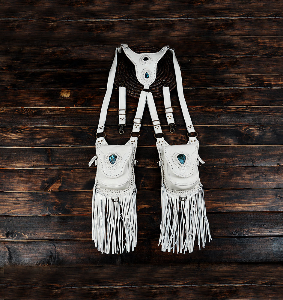 Stylish leather shoulder holster with fringe for hands free use