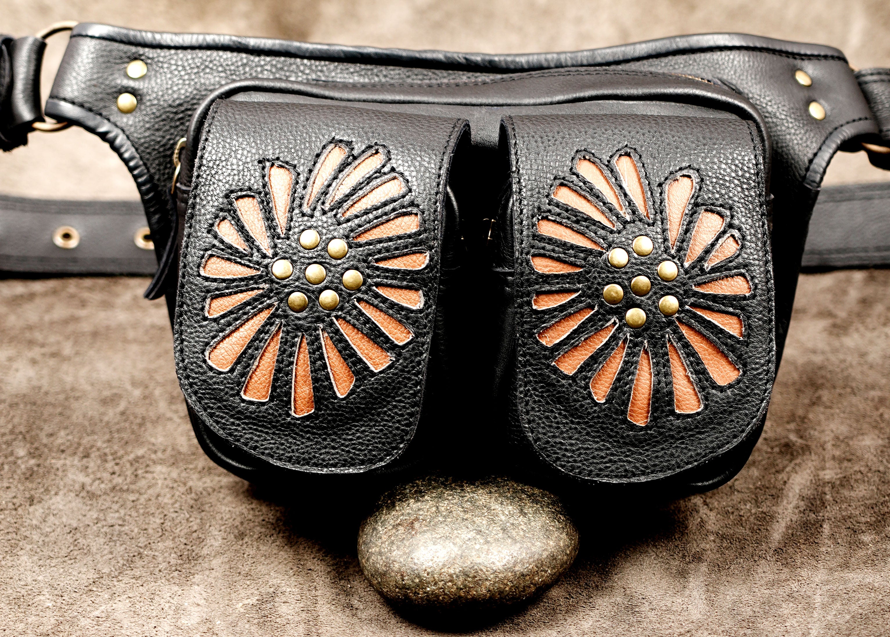 Black genuine leather belt pouch designed for festivals, travel, and everyday use.
