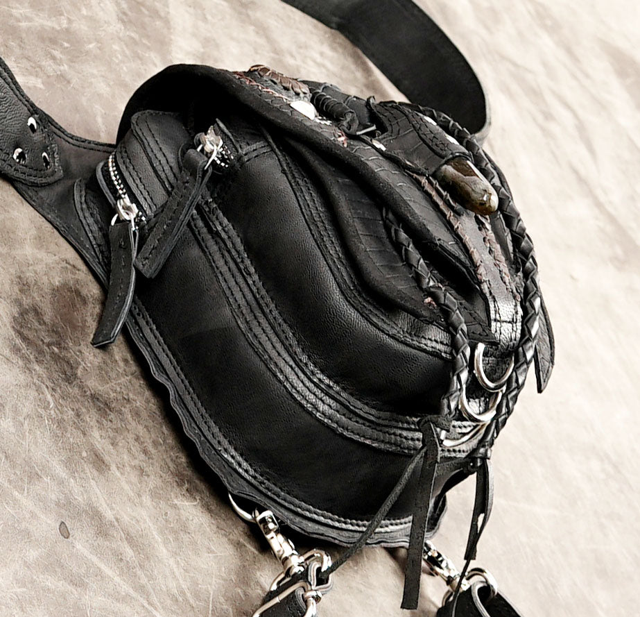 Dark alternative black leather drop-leg pouch with metal studs