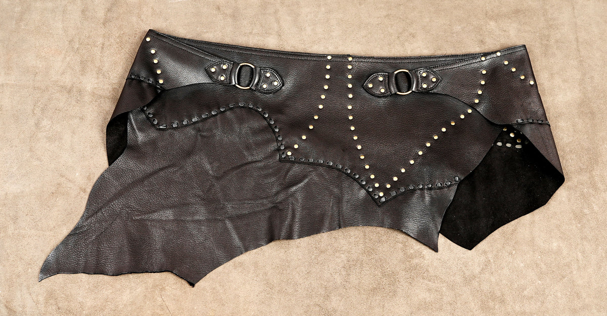 Boho leather wrap skirt with decorative stud patterns and layered panels