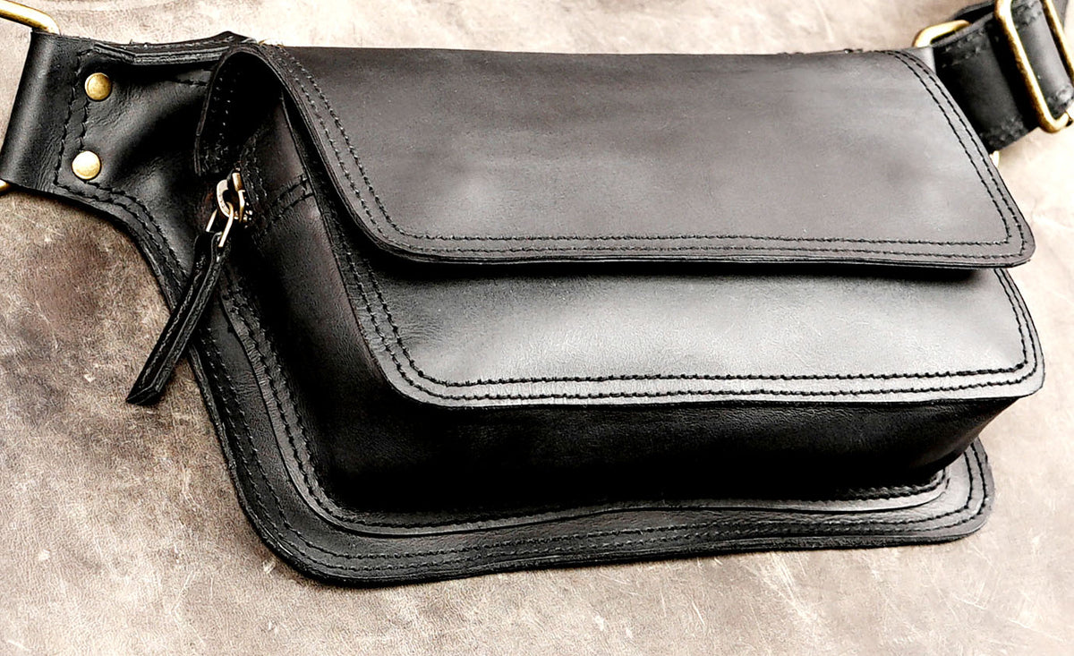 Black leather belt bag for travel and outdoor activities