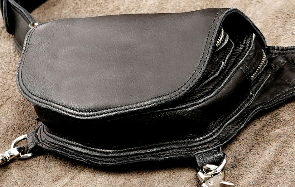 Multi-pocket black leather utility belt bag designed for motorcycle riding and hands-free travel