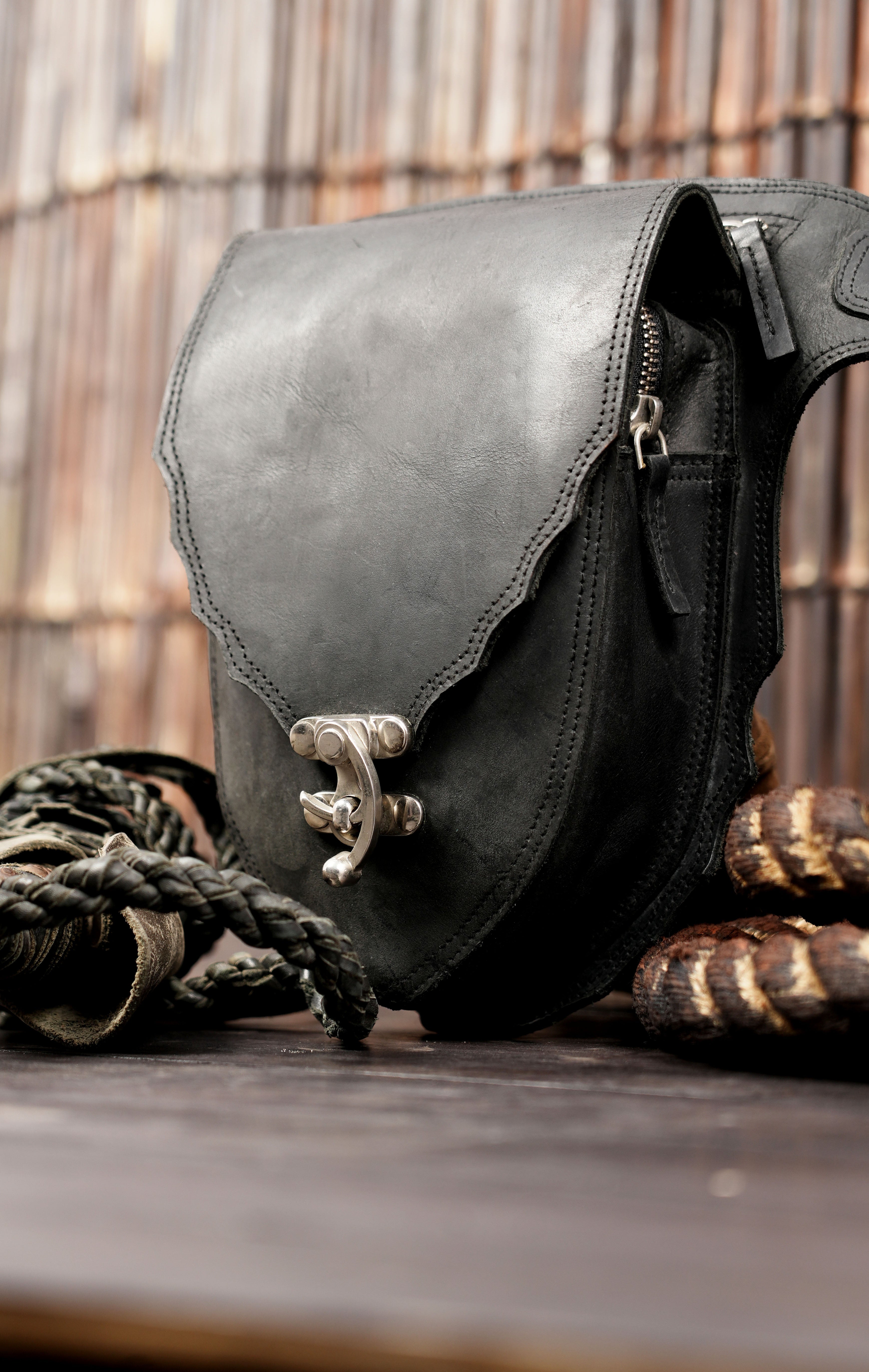 Black leather belt bag with secure hook clasp