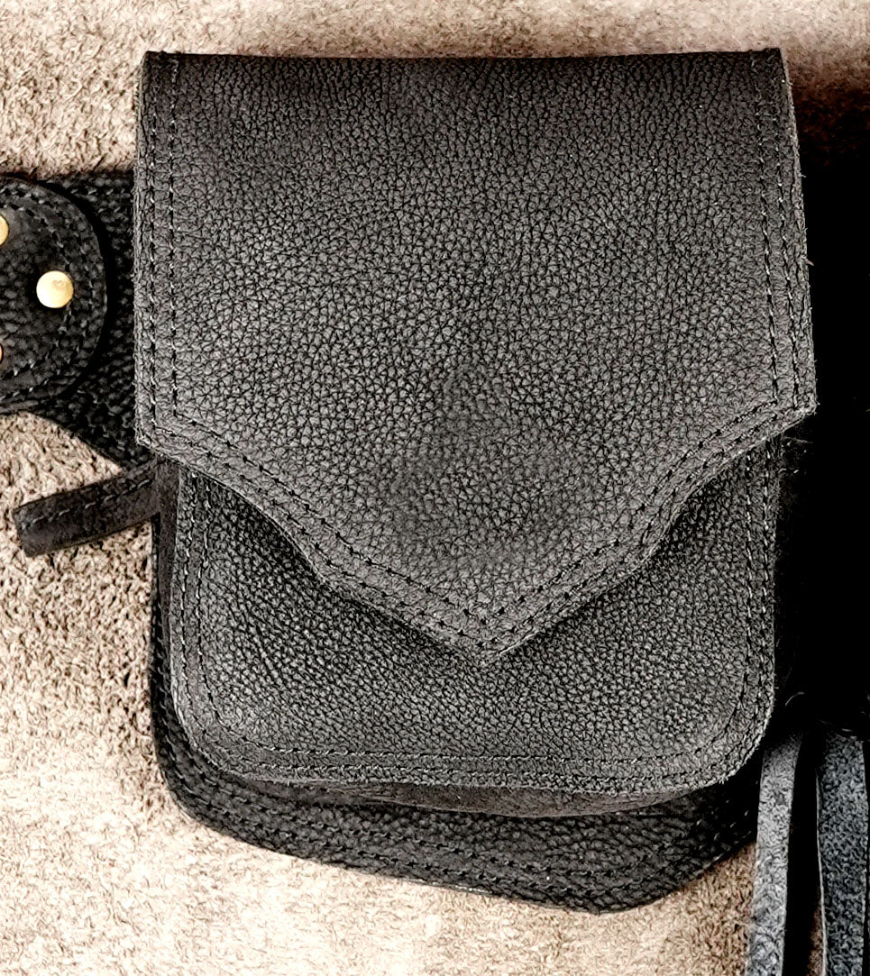 Black leather belt bag with multiple pockets and pouches