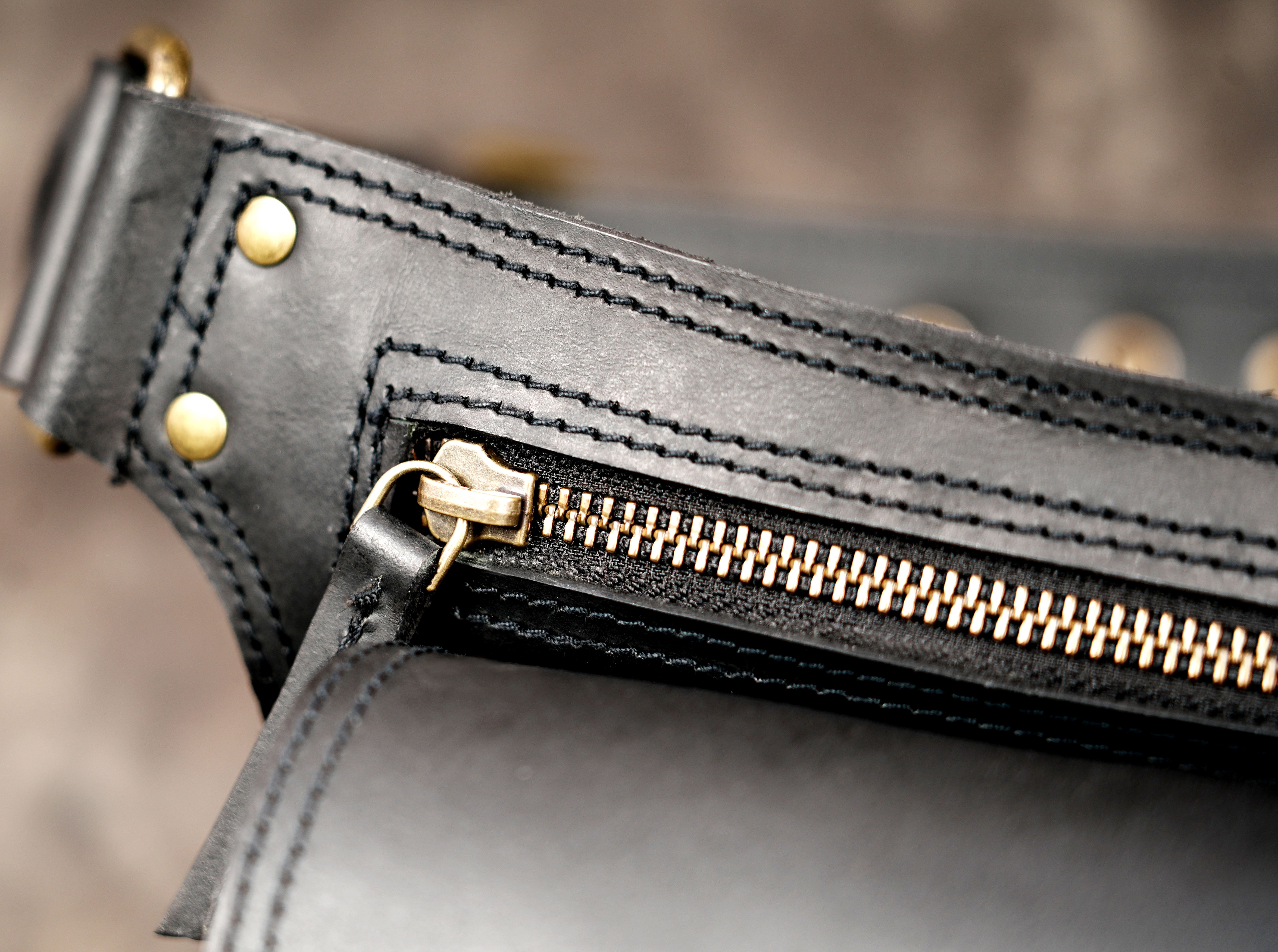 Handmade leather hip bag with brass hardware