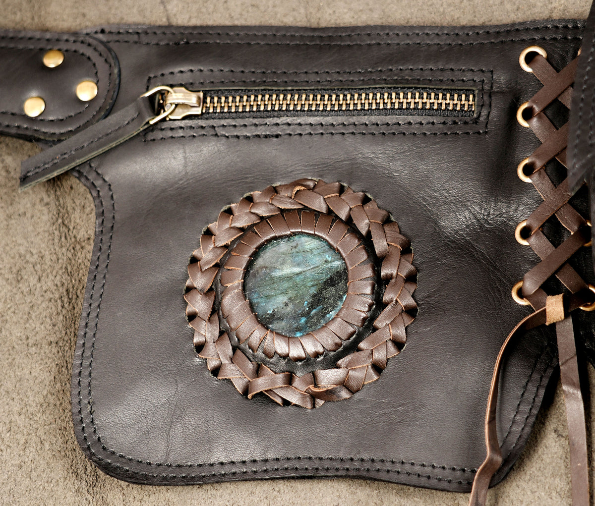 Rustic leather utility belt with multiple storage pockets