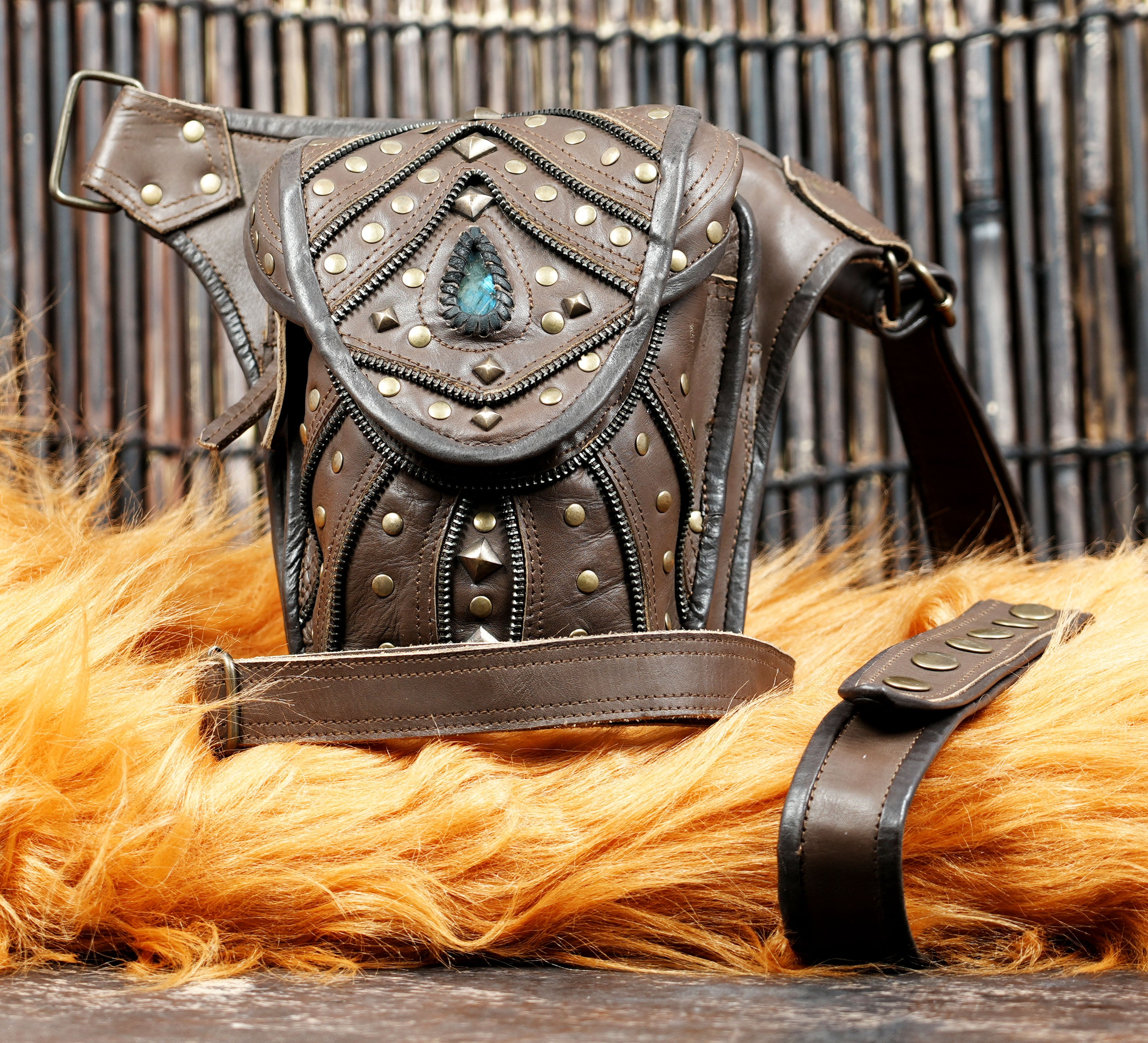 Leather thigh belt with waist strap and storage pocket