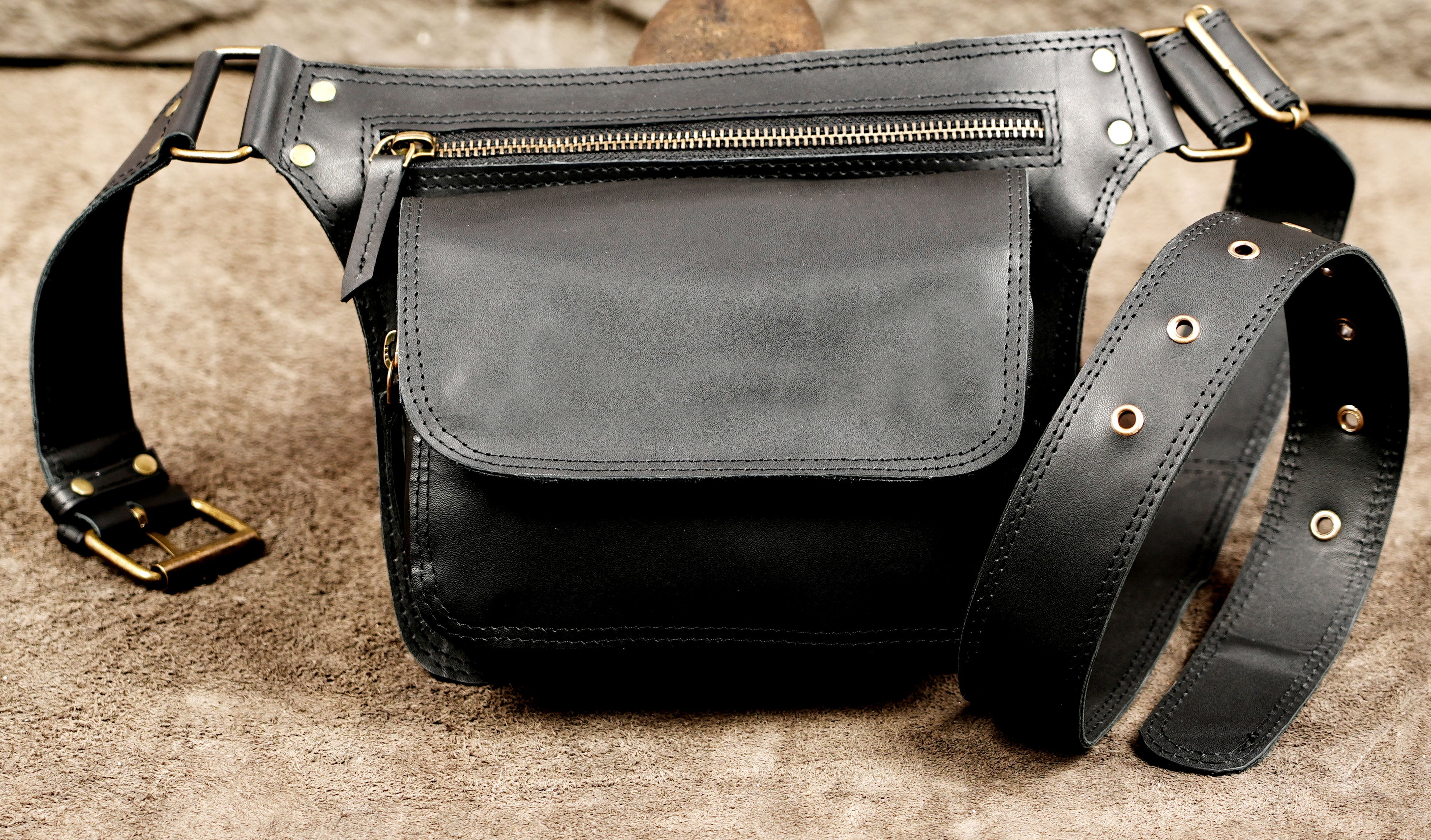Leather hip bag with antique brass hardware detail