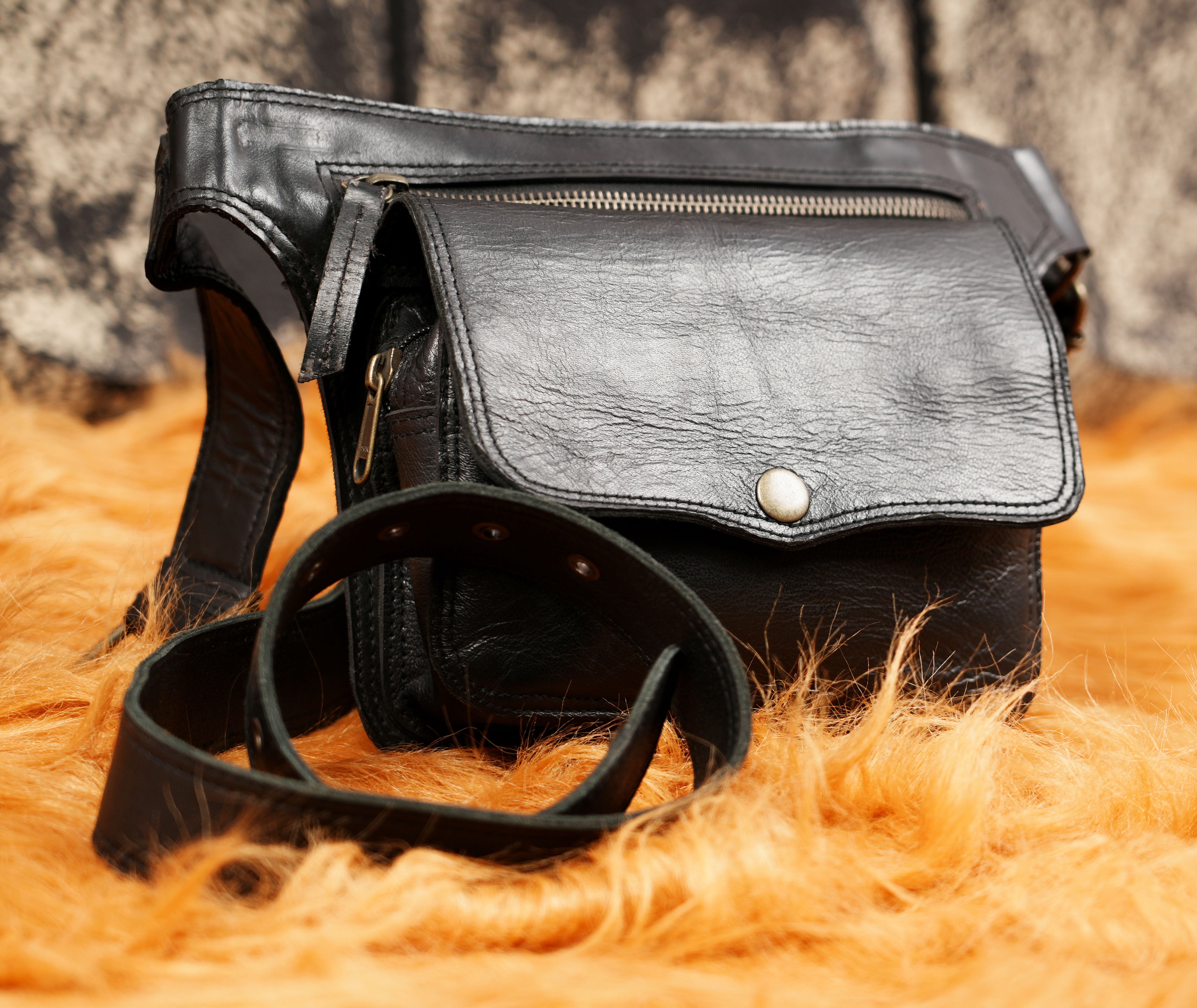 Unisex leather waist belt with functional front storage pocket