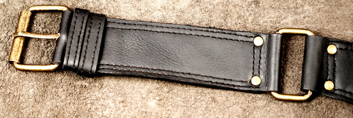 Genuine black leather utility belt featuring large and small pouches