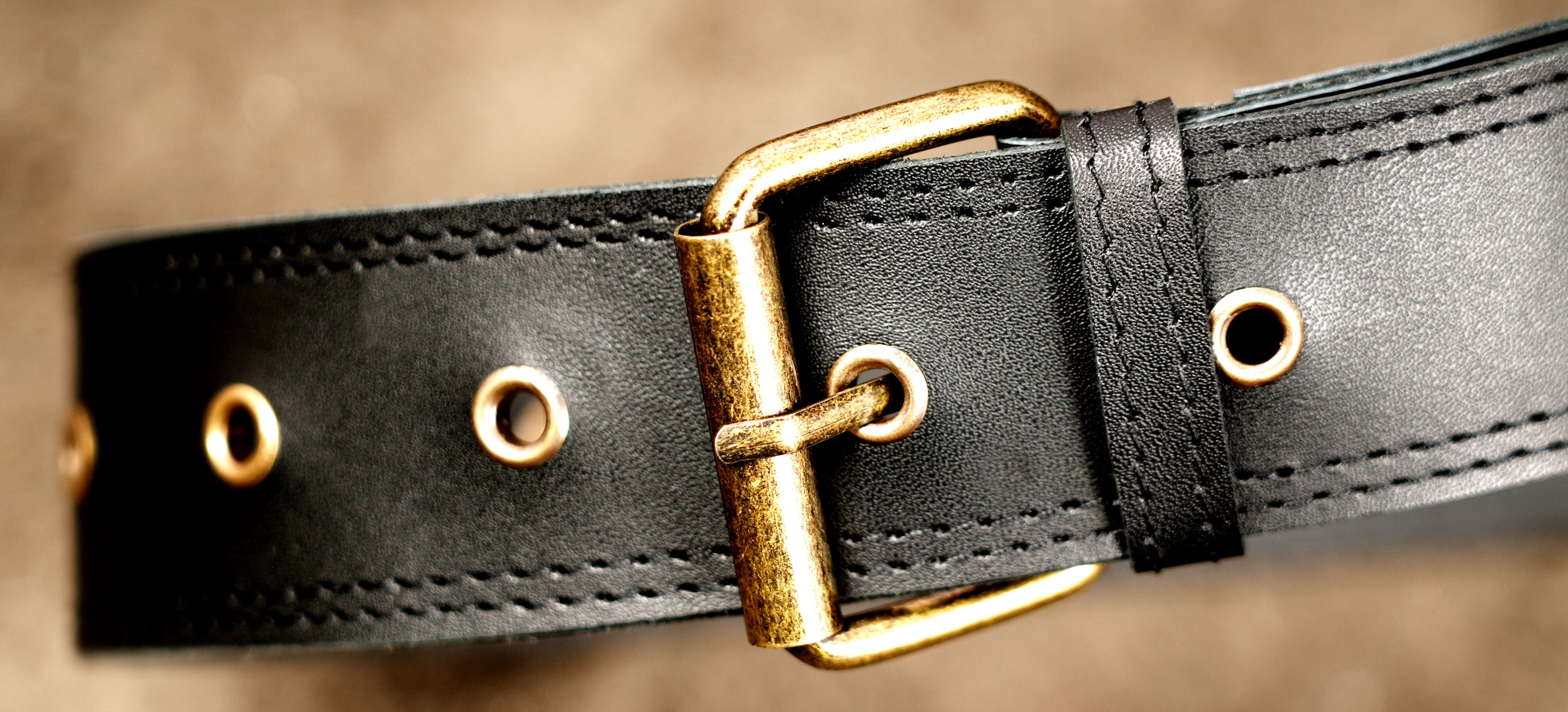 Handmade leather travel pouch with antique brass fittings