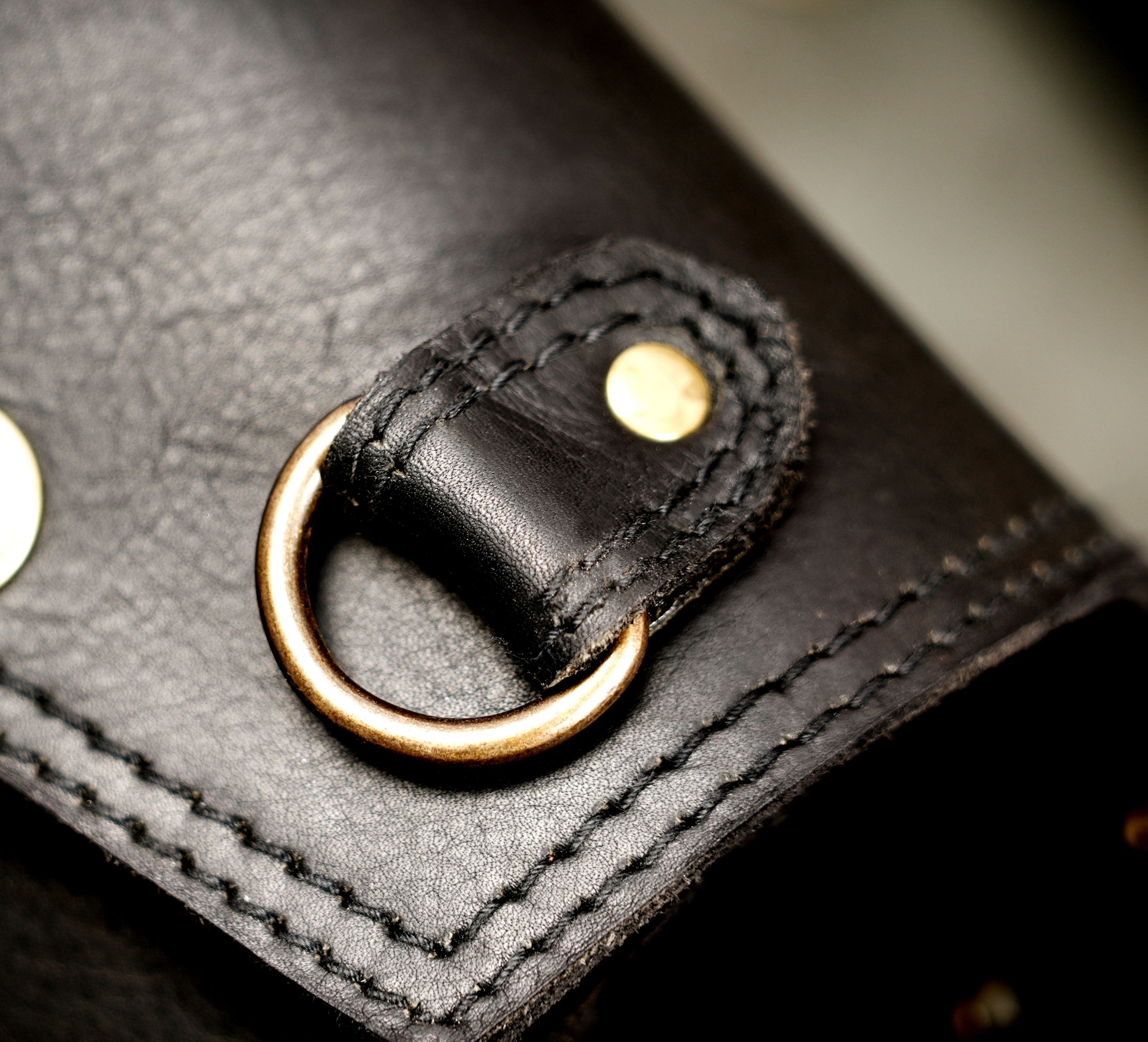 Steampunk style leather belt with rivets and O-ring buckle