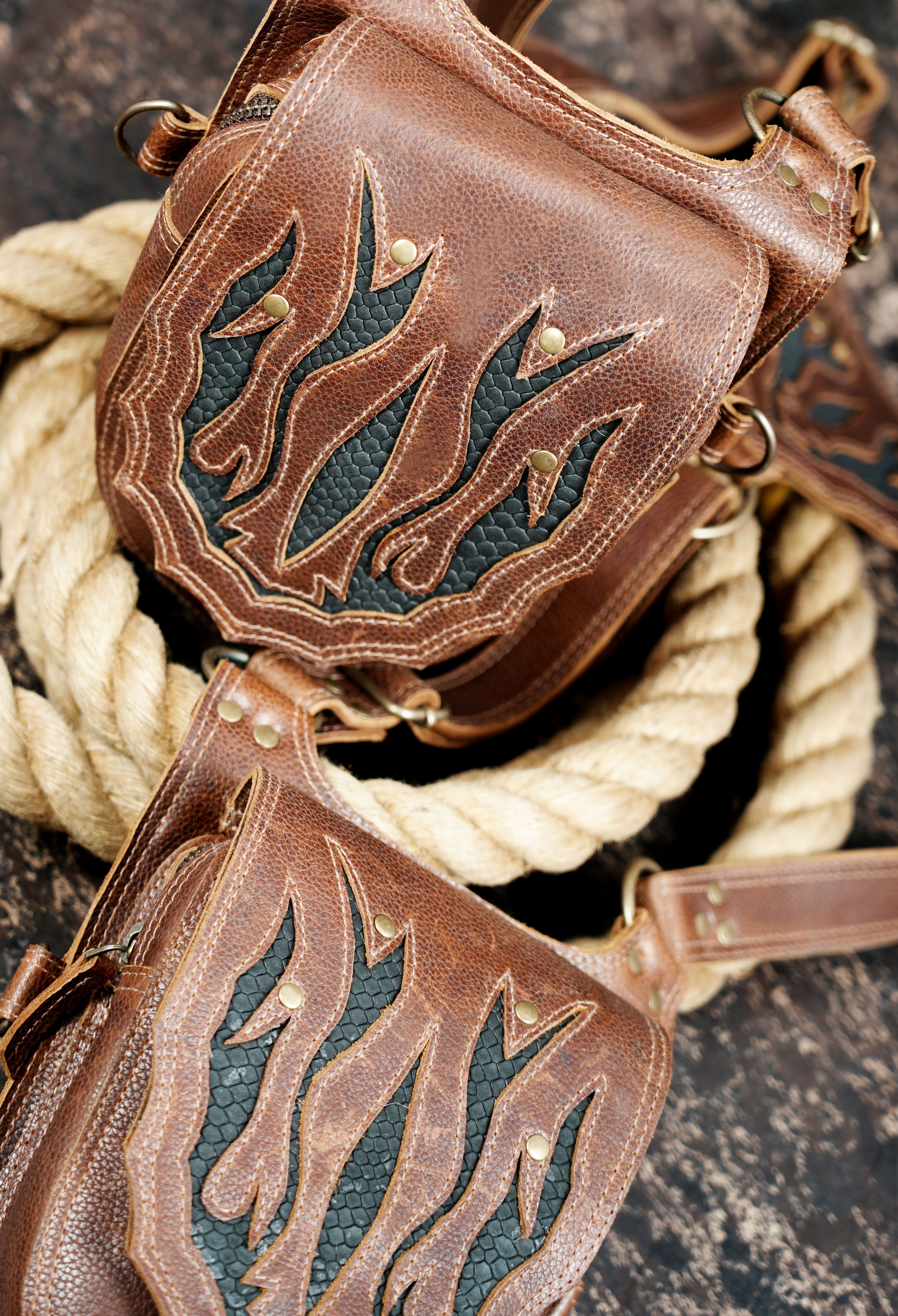 Adjustable leather holster belt with decorative stitched pattern