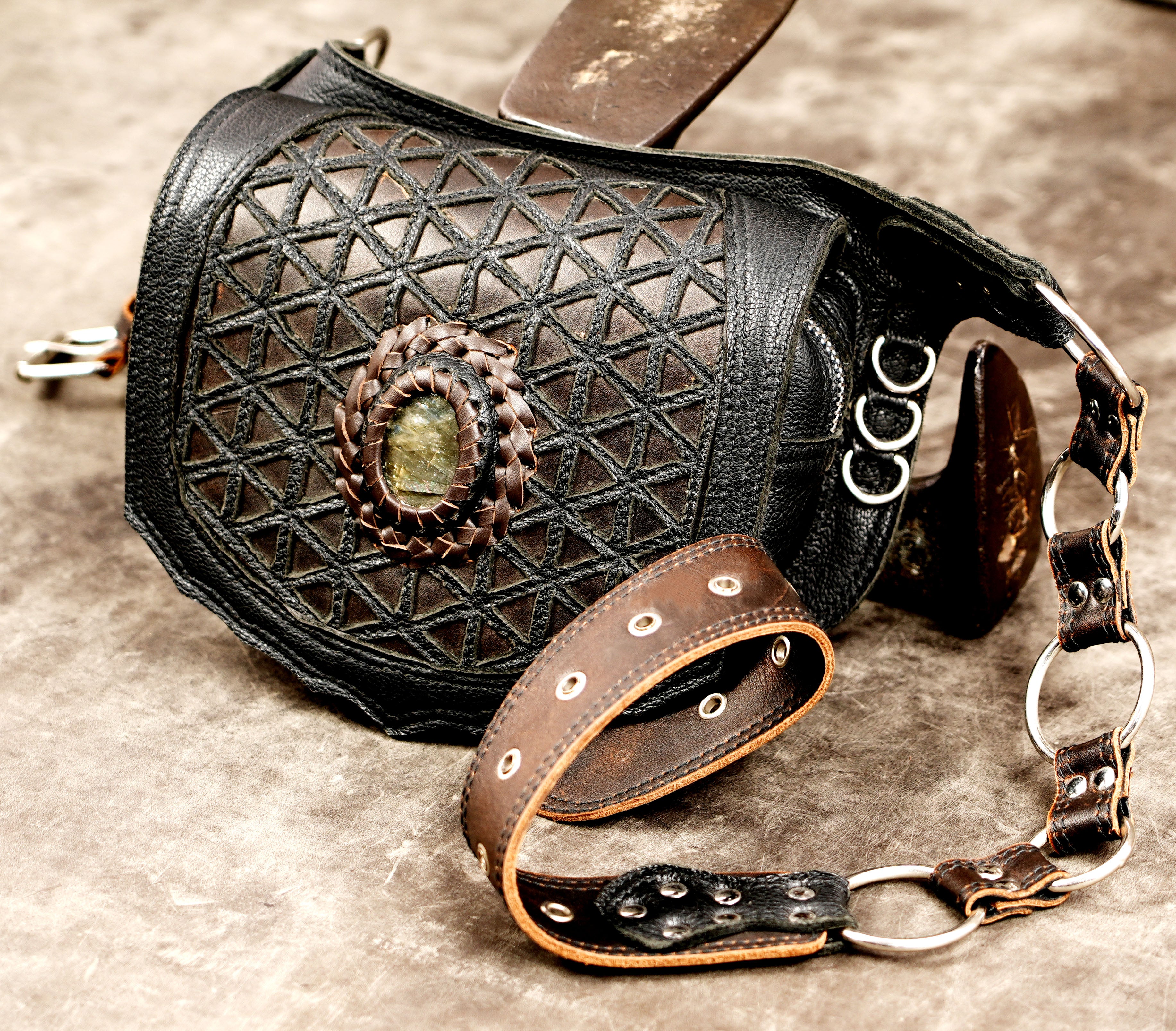 Leather hip bag with gemstone closure and silver hardware for men and women