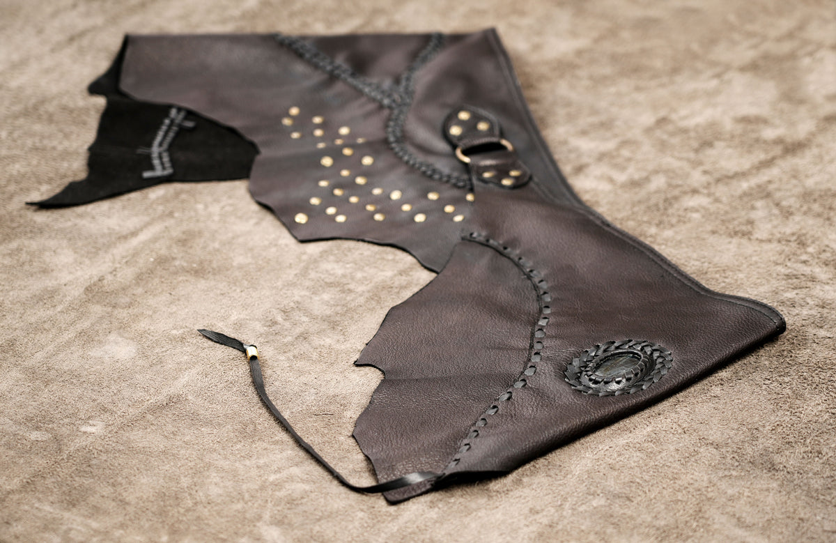 Boho leather festival skirt with handcrafted detailing and metal ring