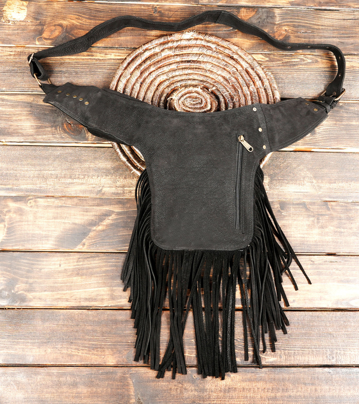 Leather boho hip pouch in black with fringe trim
