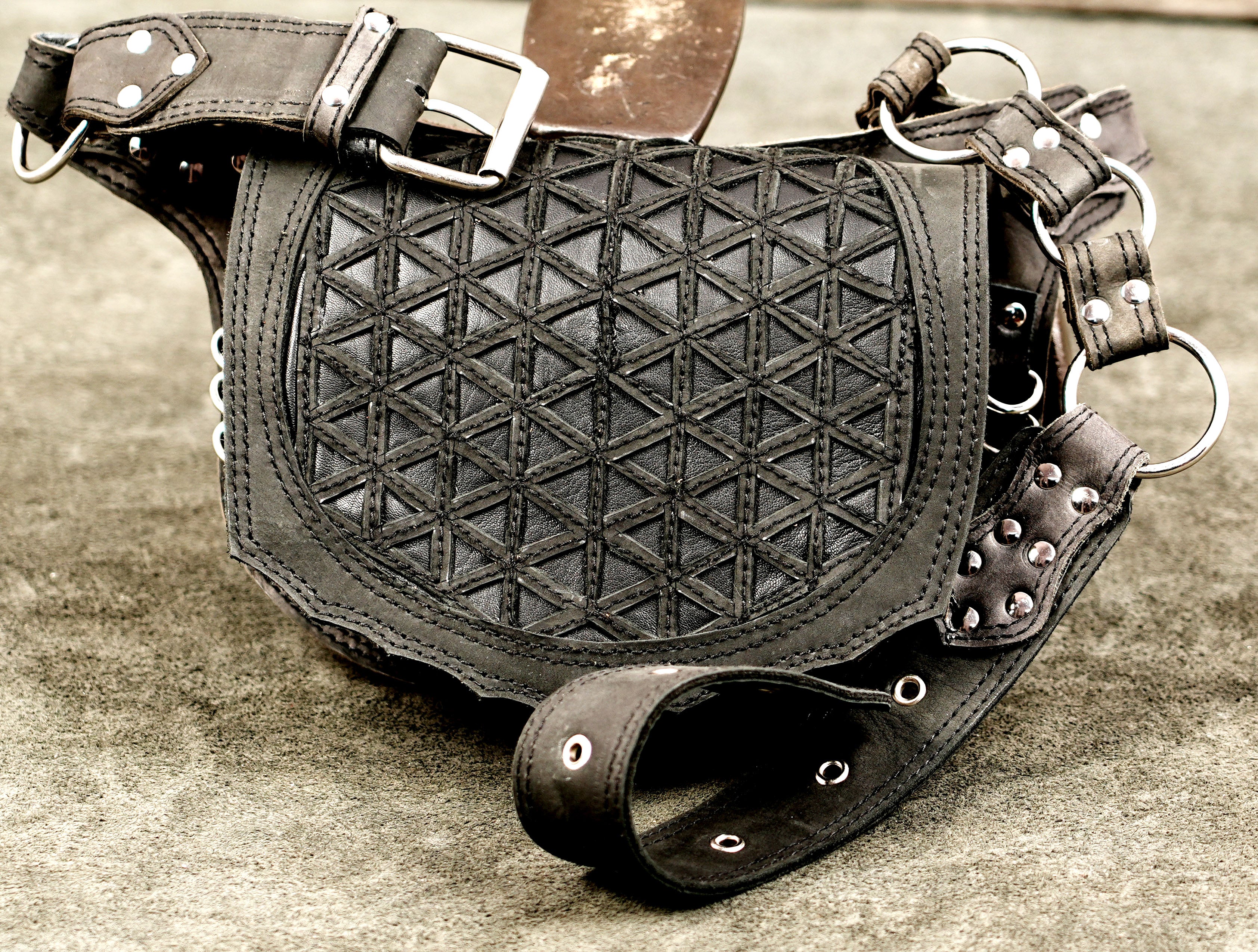 Leather festival hip pouch with handcrafted geometric leather craftsmanship