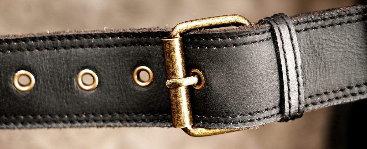 Rugged black leather belt with built-in storage bags