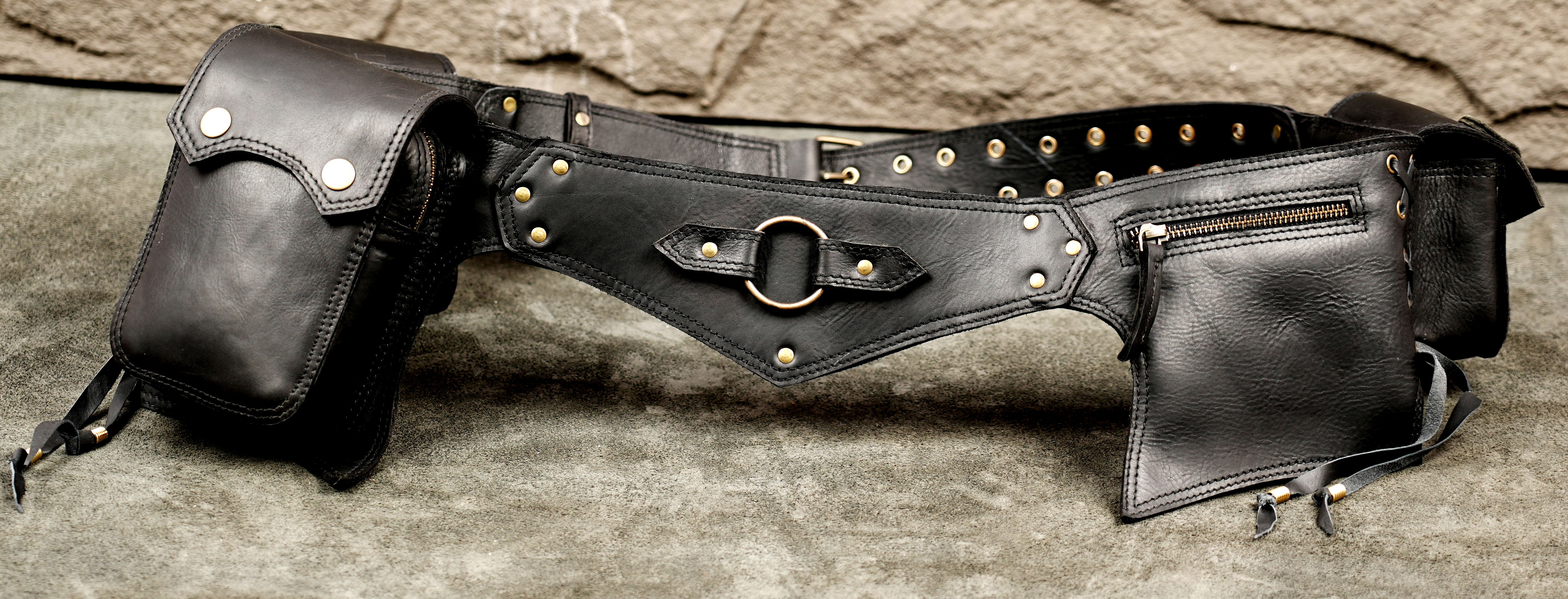 Adjustable leather waist belt with multiple attached pockets