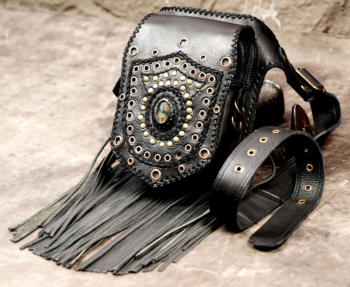 Rustic leather waist belt with flowing fringe