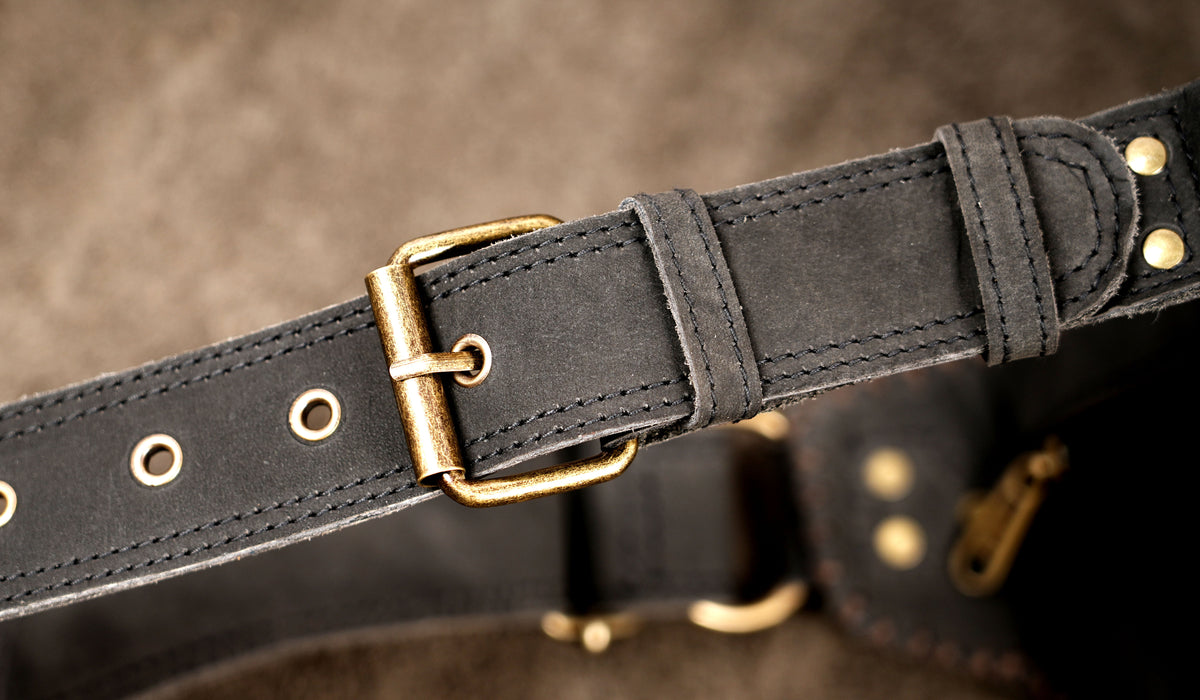 Edgy steampunk leather waist pouch with brass studs
