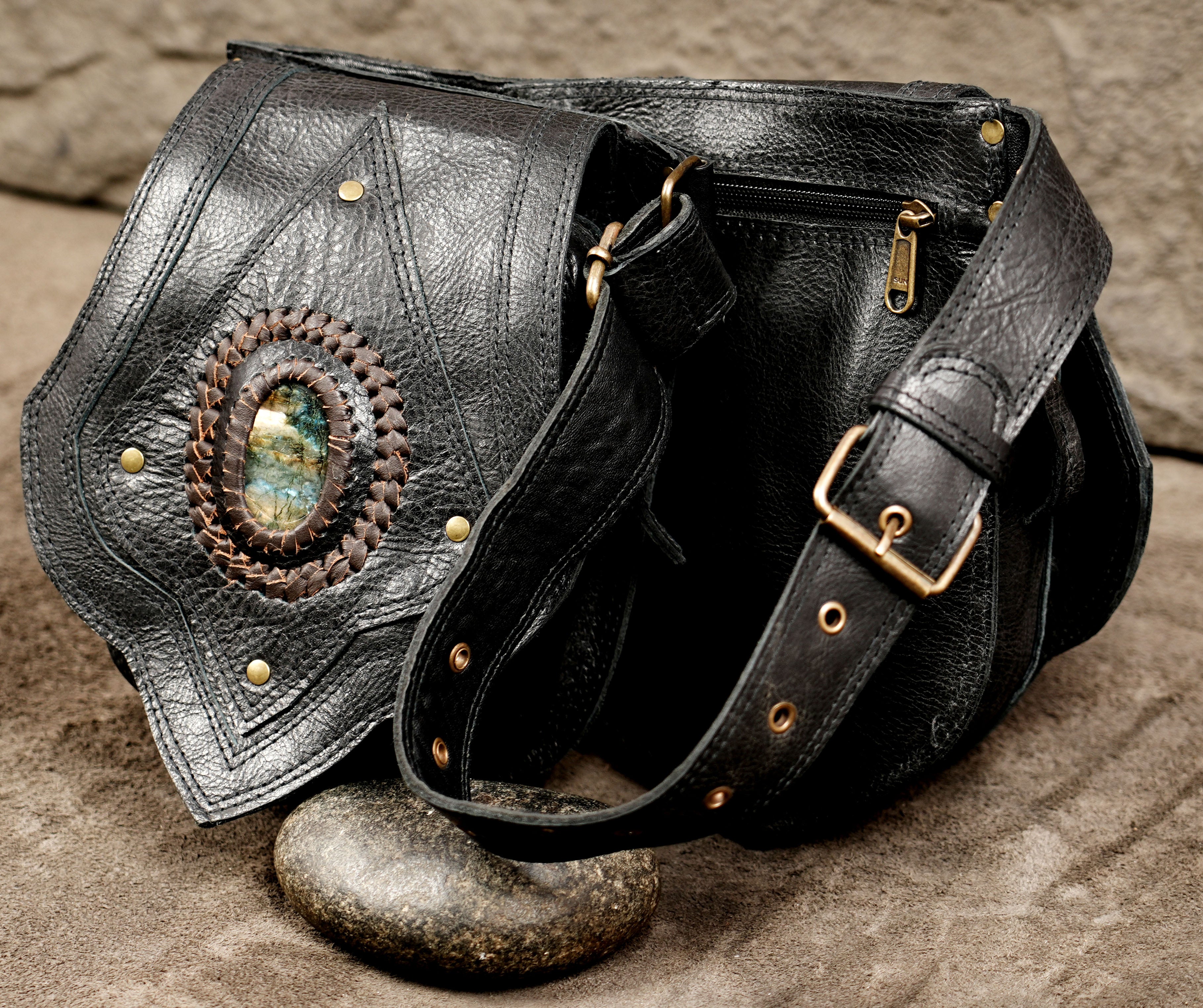 Black leather waist pouch belt with pointed flap design
