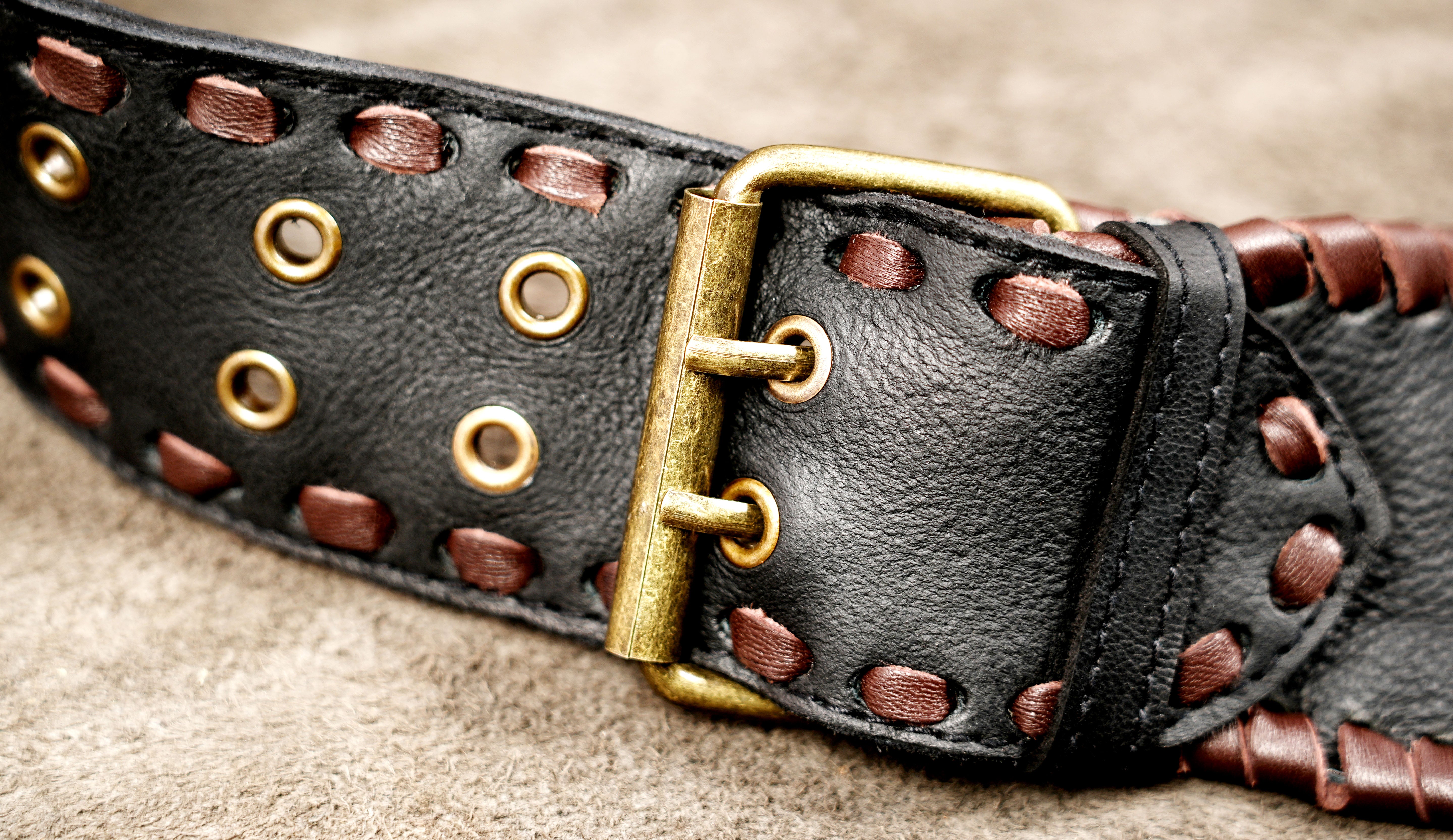 Black Leather Fringe Waist Belt Bag with Cow Print Detail and Antique Brass Hardware